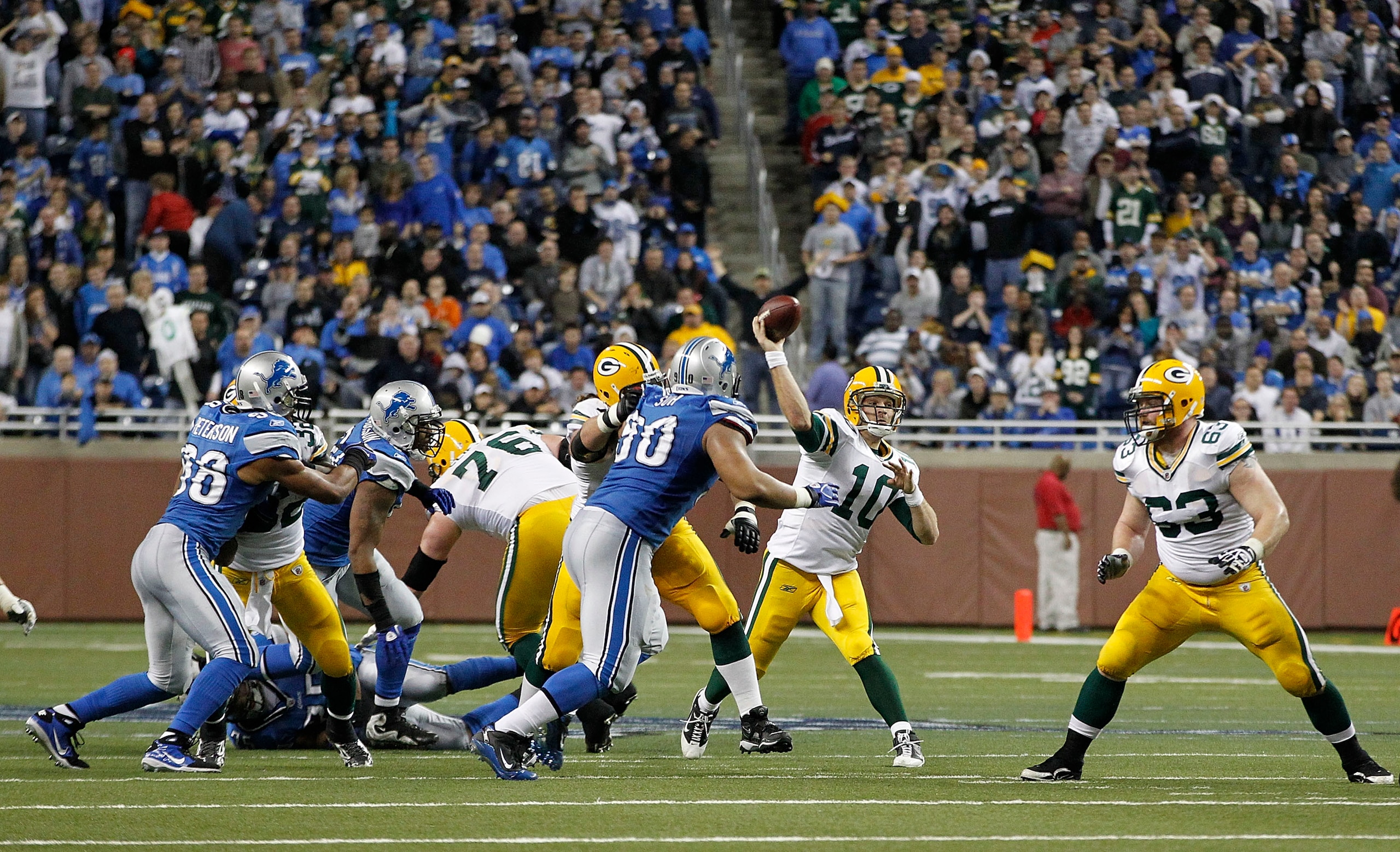 DETROIT - DECEMBER 12:  Matt Flynn #10 of the Green Bay Packers drops back to pass during the third quarter of the game against the Detroit Lions at Ford Field on December 12, 2010 in Detroit, Michigan. The Lions defeated the Packers 7-3.  (Photo by Leon