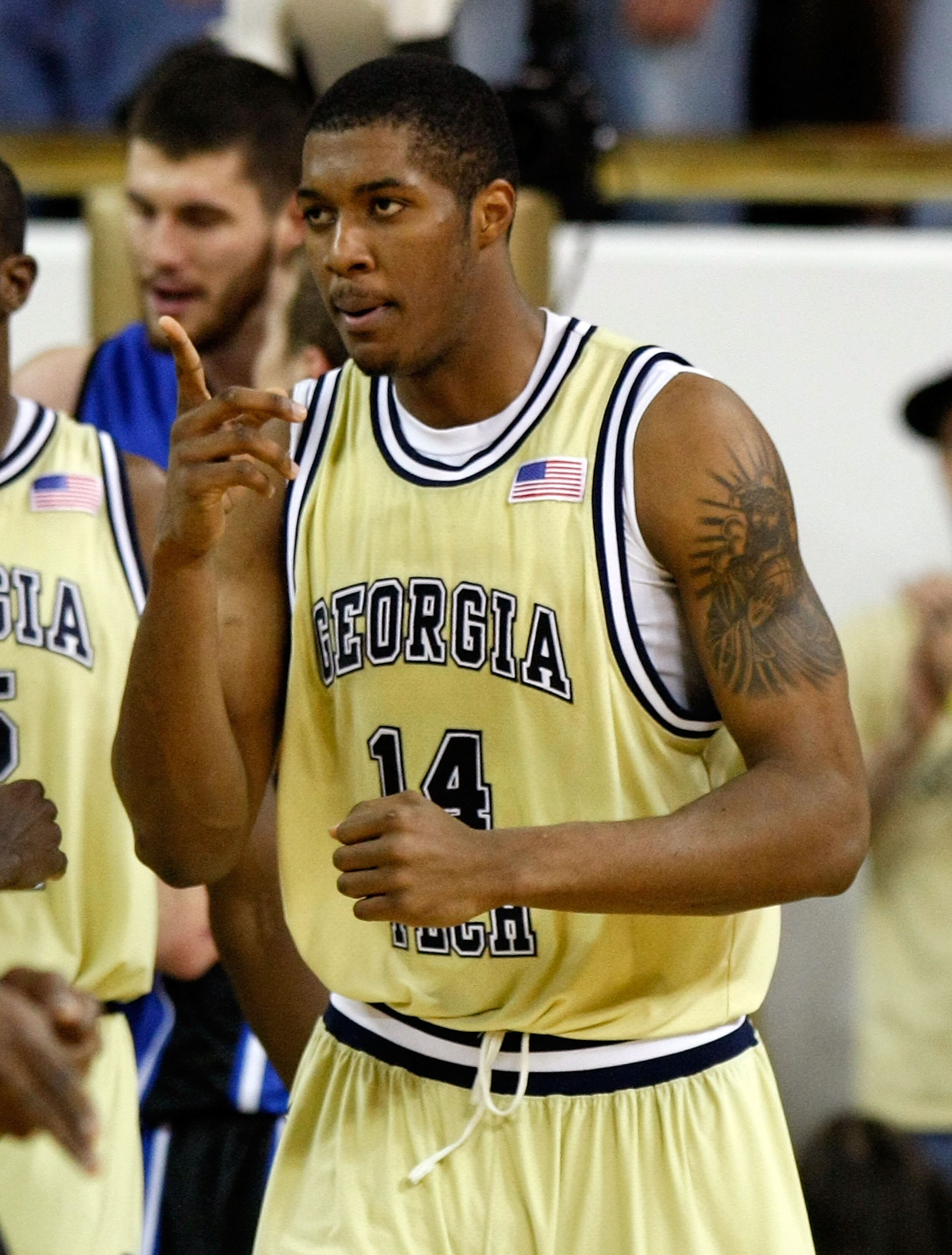 ATLANTA - JANUARY 09:  Derrick Favors #14 of the Georgia Tech Yellow Jackets reacts after drawing a foul from the Duke Blue Devils at Alexander Memorial Coliseum on January 9, 2010 in Atlanta, Georgia.  (Photo by Kevin C. Cox/Getty Images)