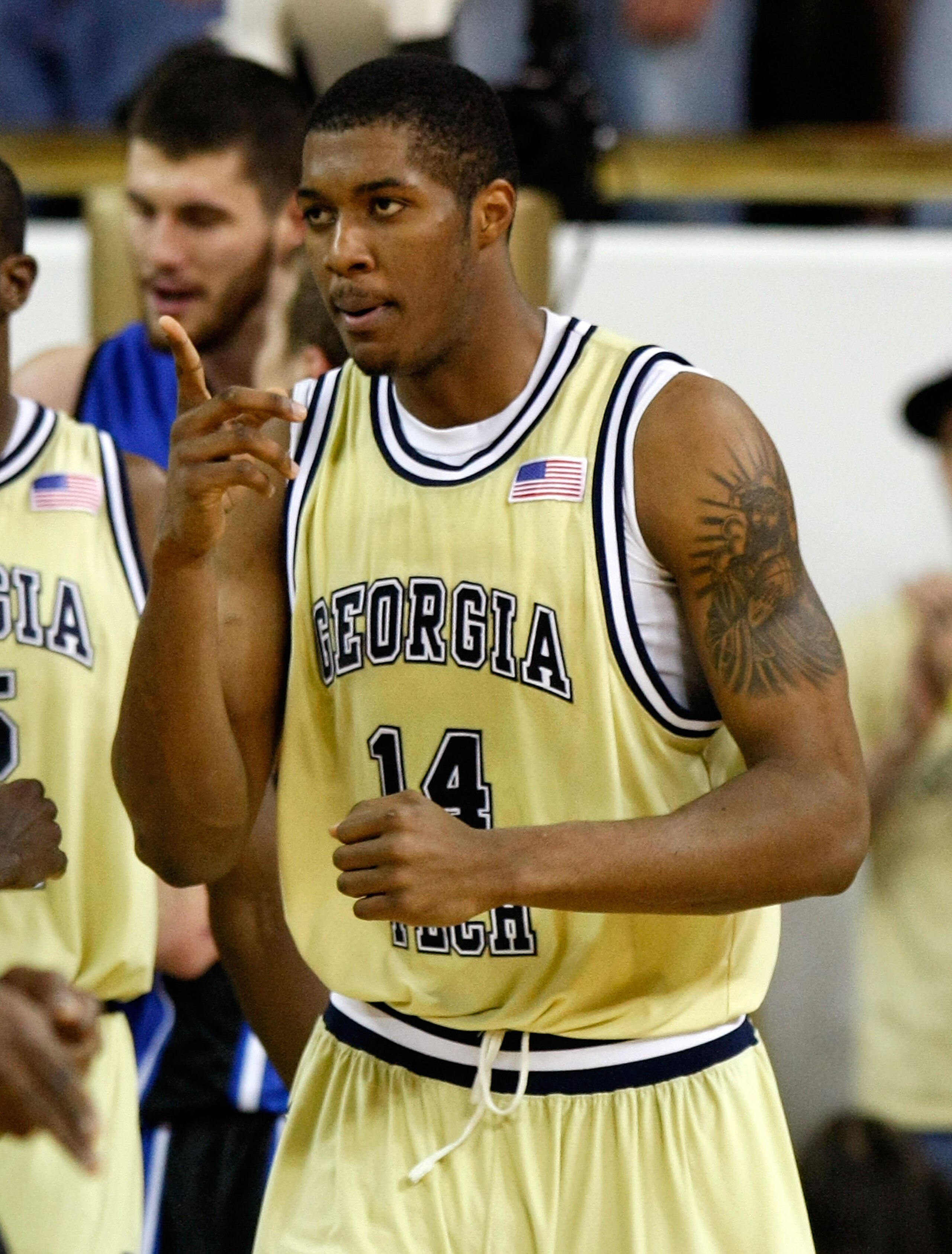 ATLANTA - JANUARY 09:  Derrick Favors #14 of the Georgia Tech Yellow Jackets reacts after drawing a foul from the Duke Blue Devils at Alexander Memorial Coliseum on January 9, 2010 in Atlanta, Georgia.  (Photo by Kevin C. Cox/Getty Images)