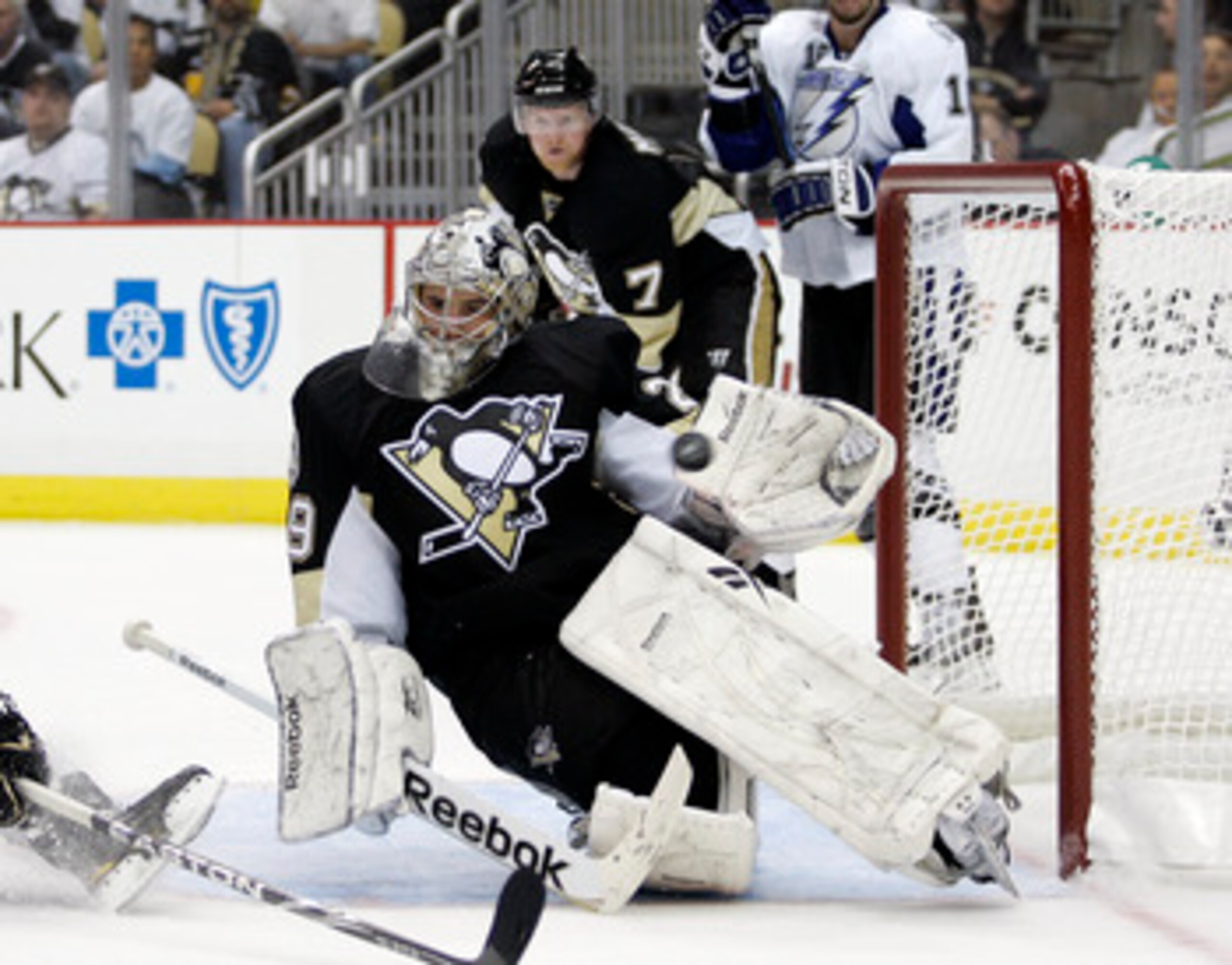 PITTSBURGH, PA - APRIL 27: Marc-Andre Fleury #29 of the Pittsburgh Penguins makes a glove save during a power play against the Tampa Bay Lightning in Game Seven of the Eastern Conference Quarterfinals during the 2011 NHL Stanley Cup Playoffs at Consol En PITTSBURGH, PA - APRIL 27: Marc-Andre Fleury #29 of the Pittsburgh Penguins makes a glove save during a power play against the Tampa Bay Lightning in Game Seven of the Eastern Conference Quarterfinals during the 2011 NHL Stanley Cup Playoffs at Consol En