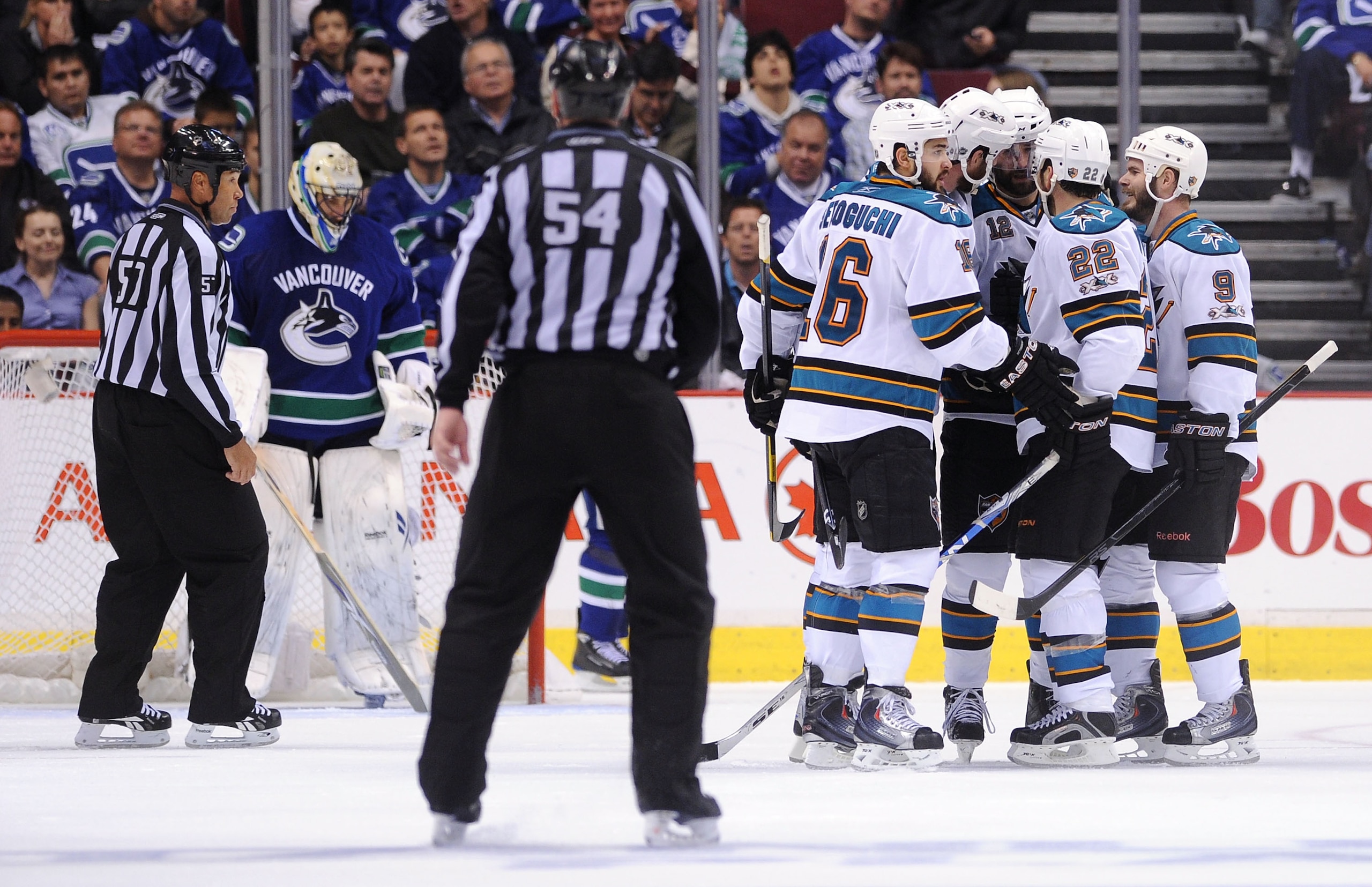 VANCOUVER, BC - MAY 15:  Patrick Marleau #12 of the San Jose Sharks celebrates his second period goal with teammates Devin Setoguchi #16, Joe Thornton #19, Dan Boyle #22 and Ian White #9 as goaltender Roberto Luongo #1 of the Vancouver Canucks looks on in