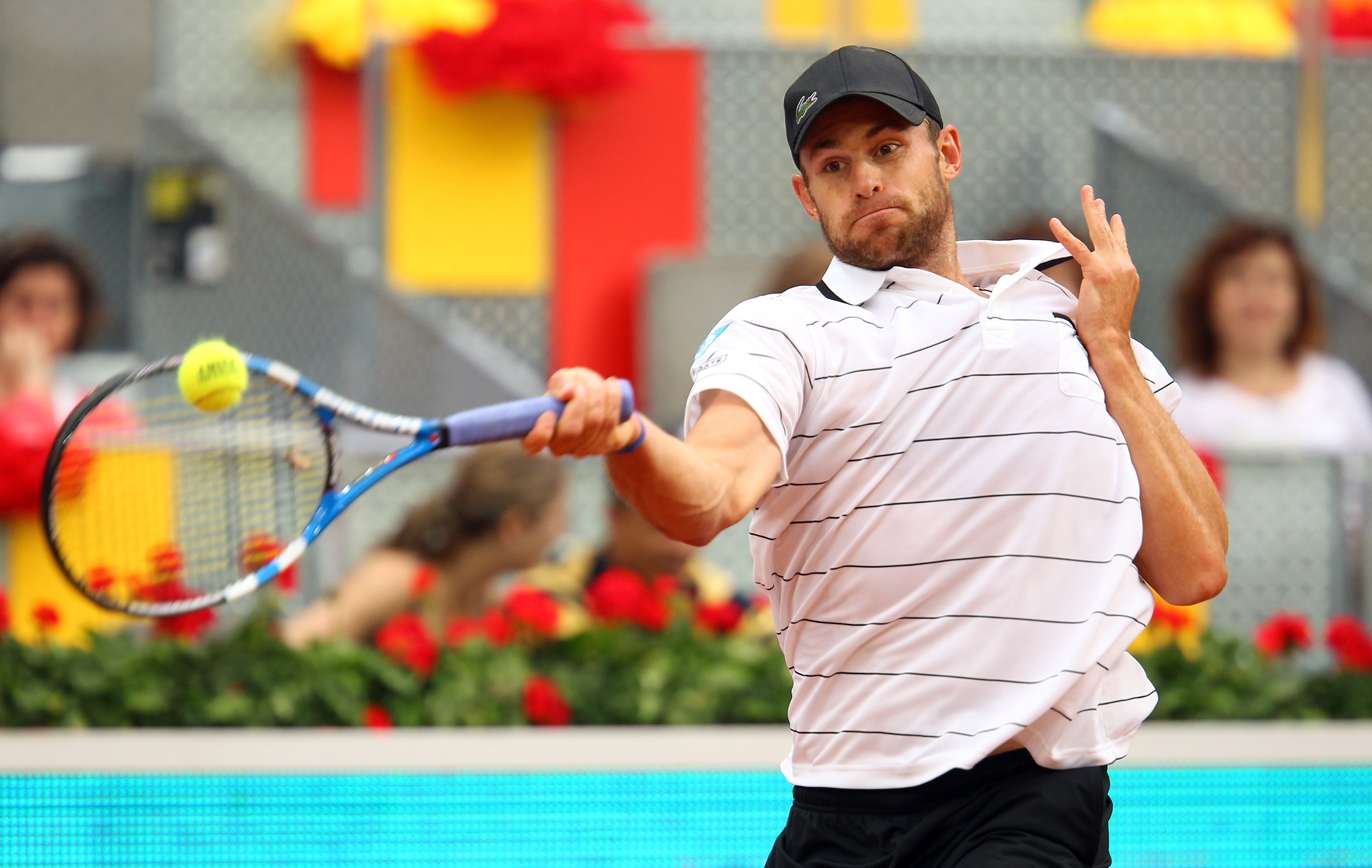 MADRID, SPAIN - MAY 02:  Andy Roddick of USA in action in his match against Flavio Cipolla of Italy during day three of the Mutua Madrilena Madrid Open Tennis on May 2, 2011 in Madrid, Spain.  (Photo by Julian Finney/Getty Images)