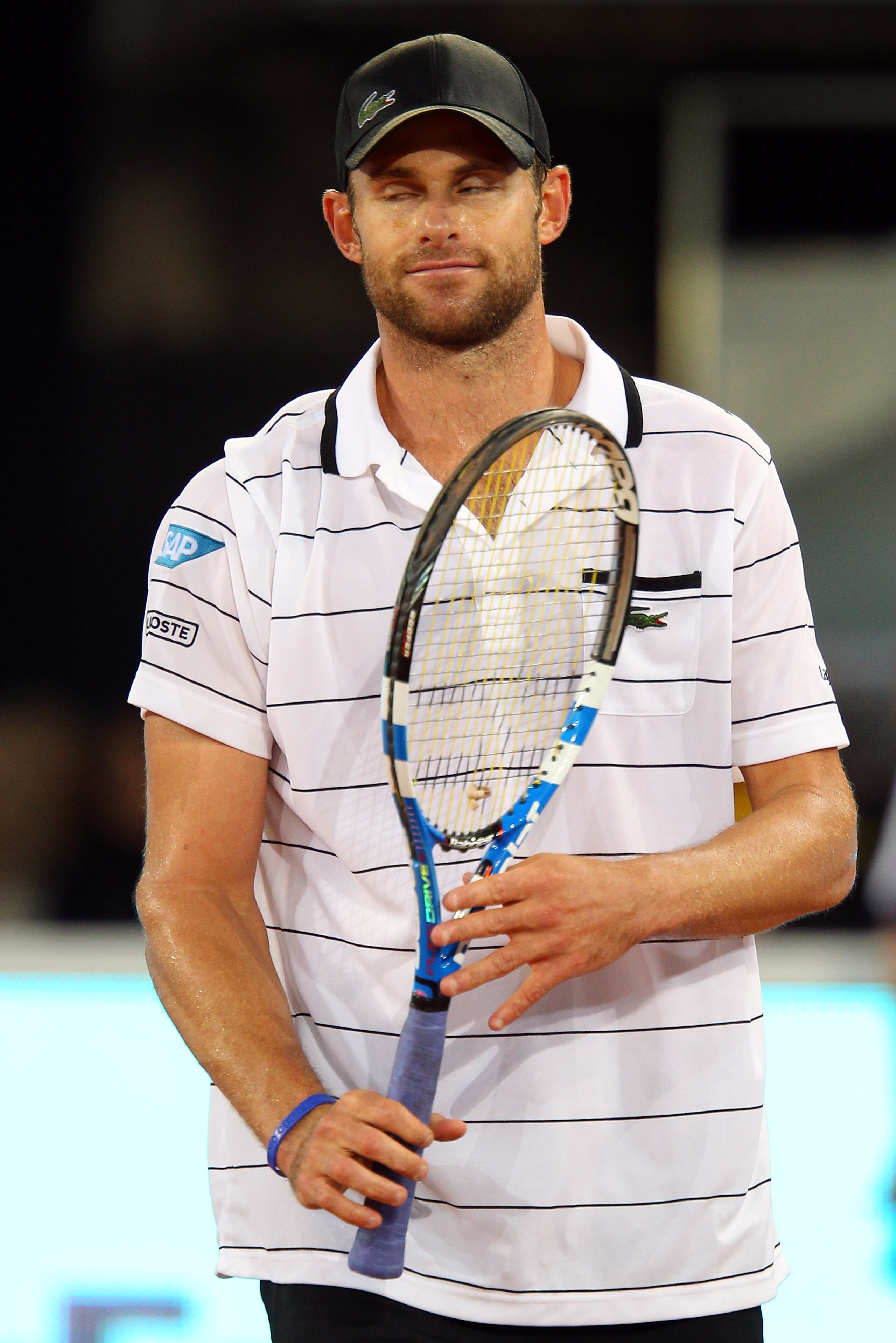 MADRID, SPAIN - MAY 02:  Andy Roddick of USA looks on in his match against Flavio Cipolla of Italy during day three of the Mutua Madrilena Madrid Open Tennis on May 2, 2011 in Madrid, Spain.  (Photo by Julian Finney/Getty Images)