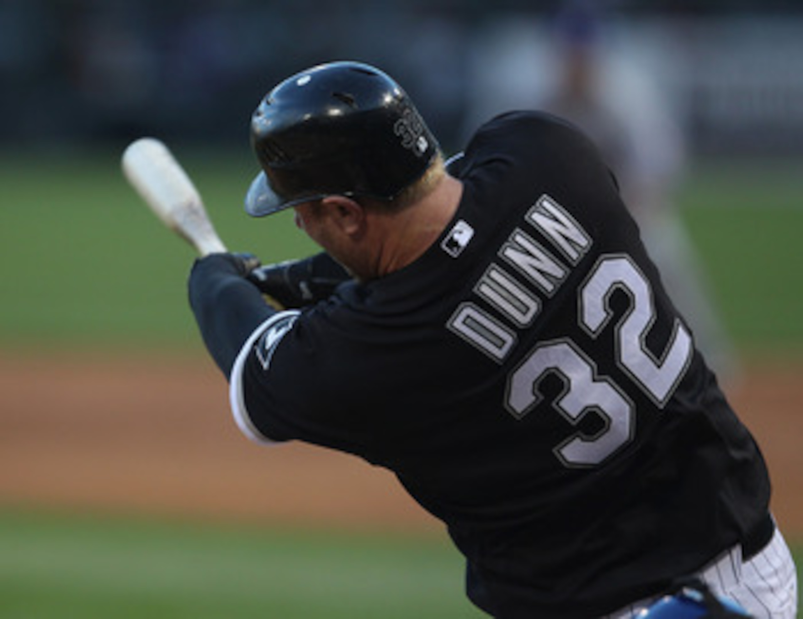 CHICAGO, IL - MAY 16: Adam Dunn #32 of the Chicago White Sox takes a swing against the Texas Rangers at U.S. Cellular Field on May 16, 2011 in Chicago, Illinois. The Rangers defeated the White Sox 4-0. (Photo by Jonathan Daniel/Getty Images)