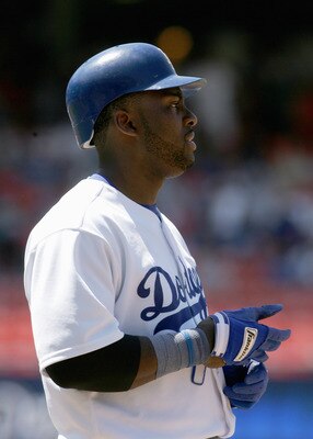 LOS ANGELES - JULY 28:  Milton Bradley #21of the Los Angeles Dodgers looks on the field during the game against the Cincinnati Reds on July 28, 2005 at Dodger Stadium in Los Angeles, California.  The Reds won 6-1. (Photo by Stephen Dunn /Getty Images)