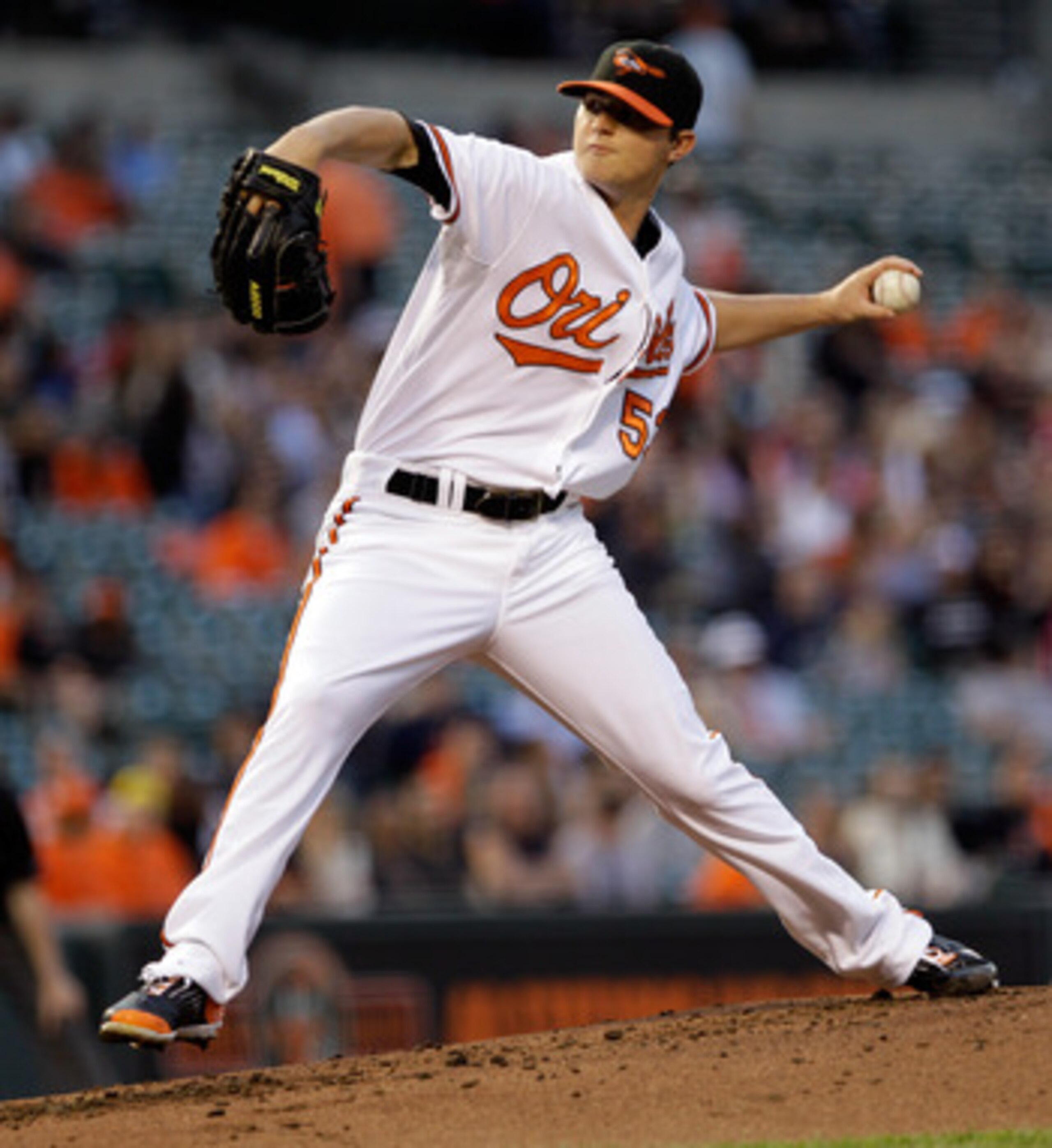 BALTIMORE, MD - MAY 12:  Starting pitcher Zach Britton #53 of the Baltimore Orioles delivers to a Seattle Mariners batter at Oriole Park at Camden Yards on May 12, 2011 in Baltimore, Maryland.  (Photo by Rob Carr/Getty Images)