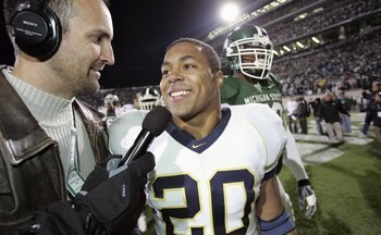 EAST LANSING, MI - NOVEMBER 3:  Mike Hart #20 of the Michigan Wolverines talks with a reporter after the win against the Michigan State Spartans at Spartan Stadium November 3, 2007 in East Lansing, Michigan.  Michigan defeated Michigan State 28-24. (Photo