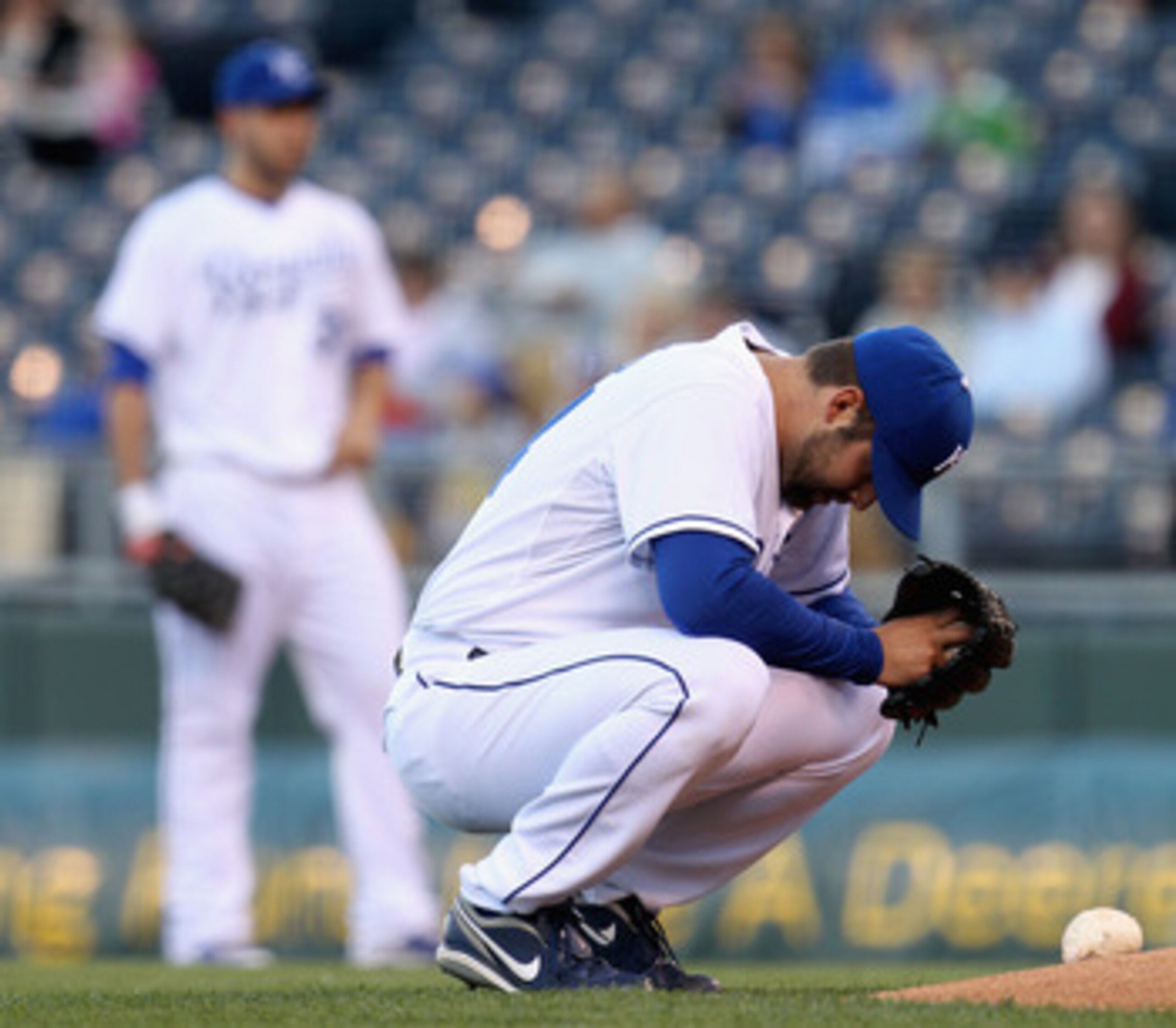 KANSAS CITY, MO - MAY 16: Starting pitcher Kyle Davies #34 of the Kansas City Royals prays just prior to the start of the game against the Cleveland Indians on May 16, 2011 at Kauffman Stadium in Kansas City, Missouri.  Davies left the game due to injury