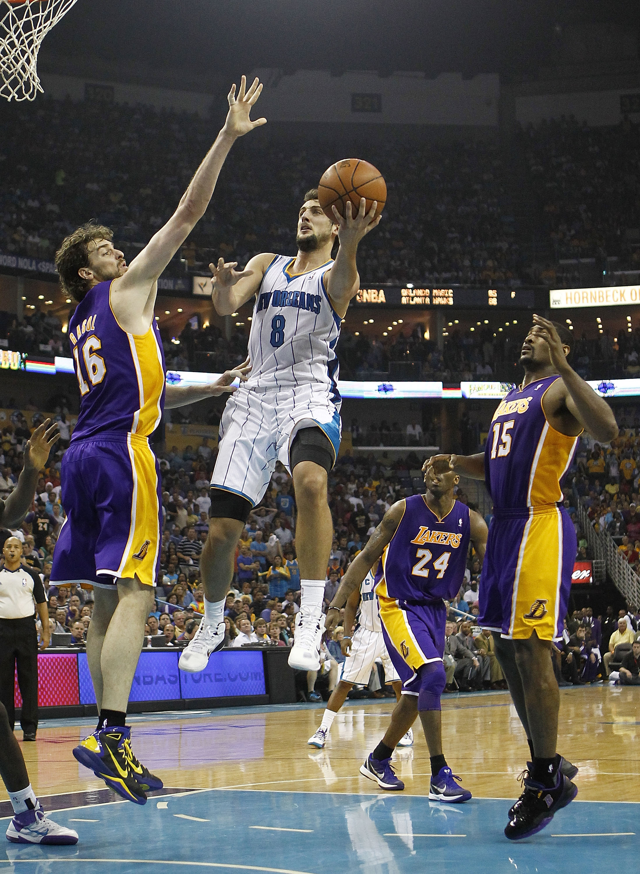 NEW ORLEANS - APRIL 24:  Marco Belinelli #8 of the New Orleans Hornets shoots over Pau Gasol #16 of the Los Angeles Lakers in Game Four of the Western Conference Quarterfinals in the 2011 NBA Playoffs at New Orleans Arena on April 24, 2011 in New Orleans,