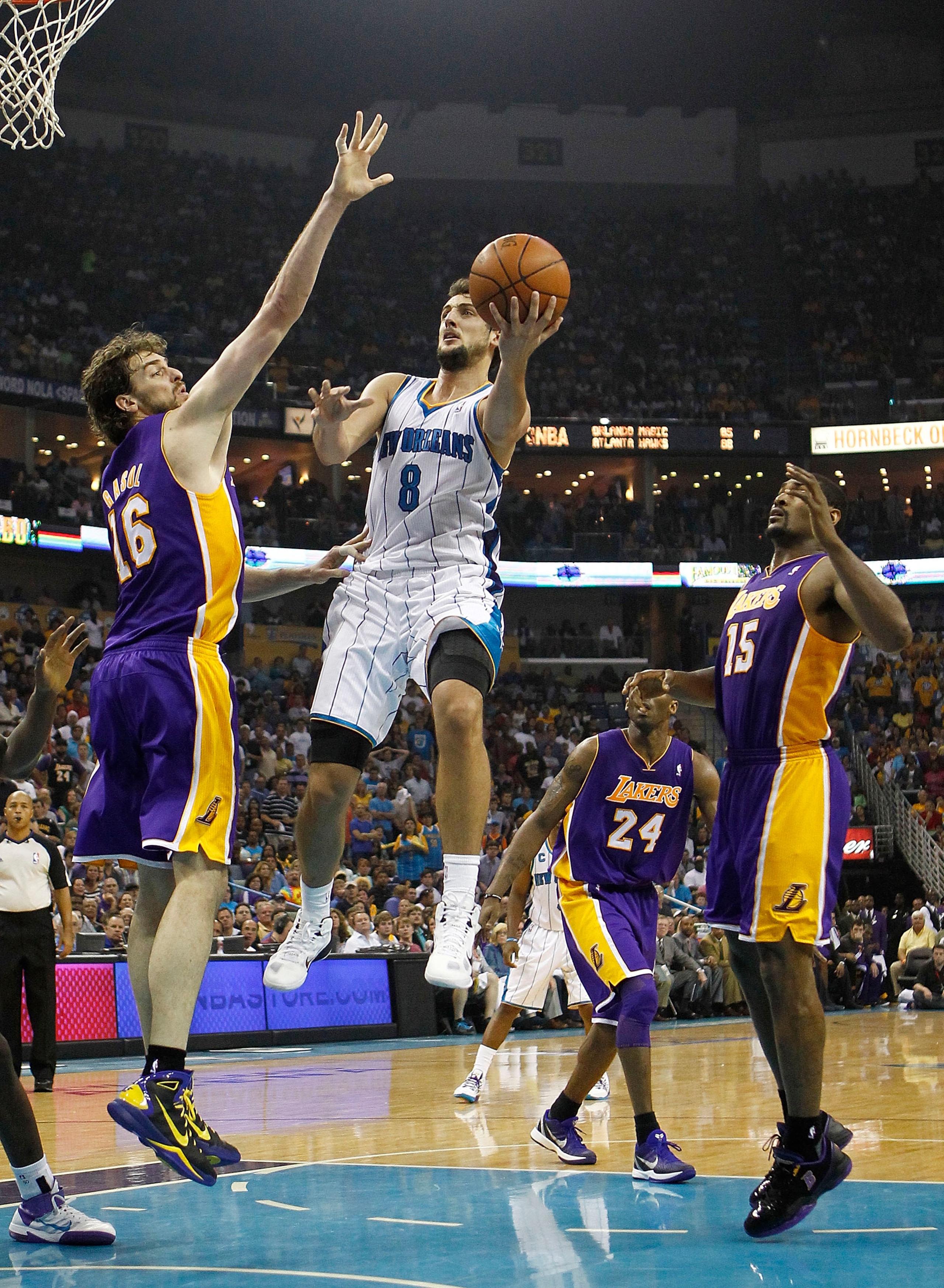 NEW ORLEANS - APRIL 24:  Marco Belinelli #8 of the New Orleans Hornets shoots over Pau Gasol #16 of the Los Angeles Lakers in Game Four of the Western Conference Quarterfinals in the 2011 NBA Playoffs at New Orleans Arena on April 24, 2011 in New Orleans,