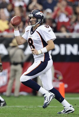 GLENDALE, AZ - DECEMBER 12:  Quarterback Kyle Orton #8 of the Denver Broncos drops back to pass during the NFL game against the Arizona Cardinals at the University of Phoenix Stadium on December 12, 2010 in Glendale, Arizona.  The Cardinals defeated the B