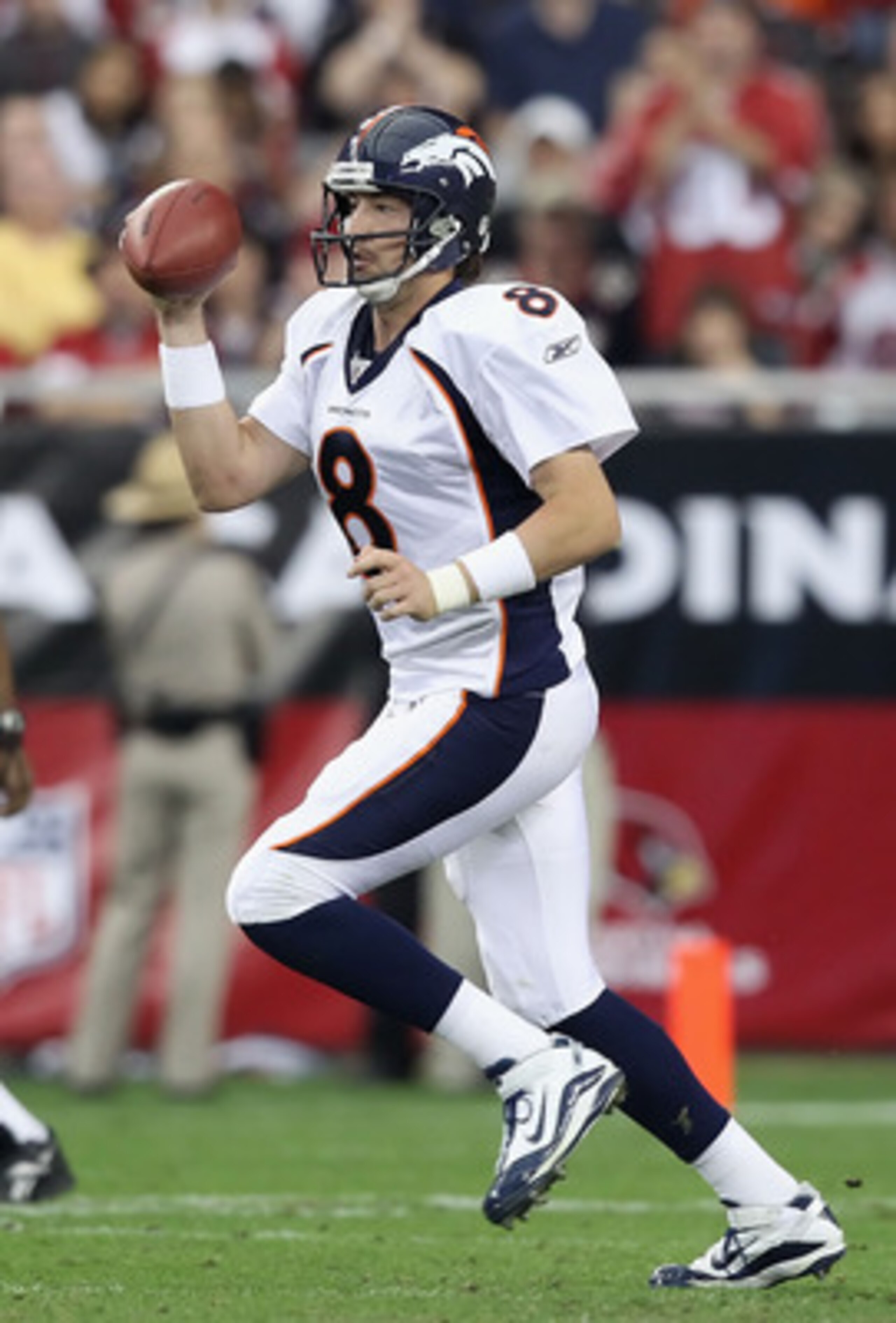 GLENDALE, AZ - DECEMBER 12:  Quarterback Kyle Orton #8 of the Denver Broncos drops back to pass during the NFL game against the Arizona Cardinals at the University of Phoenix Stadium on December 12, 2010 in Glendale, Arizona.  The Cardinals defeated the B