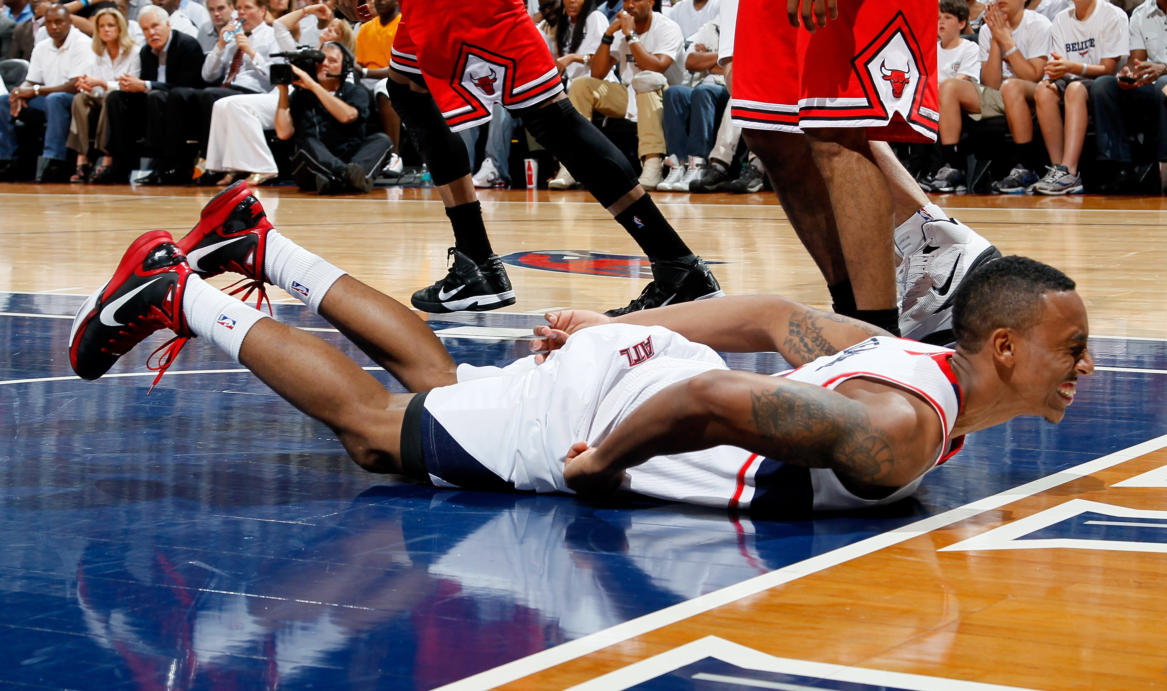 ATLANTA, GA - MAY 12:  Jeff Teague #0 of the Atlanta Hawks reacts after injuring himself against the Chicago Bulls in Game Six of the Eastern Conference Semifinals in the 2011 NBA Playoffs at Phillips Arena on May 12, 2011 in Atlanta, Georgia.  NOTE TO US