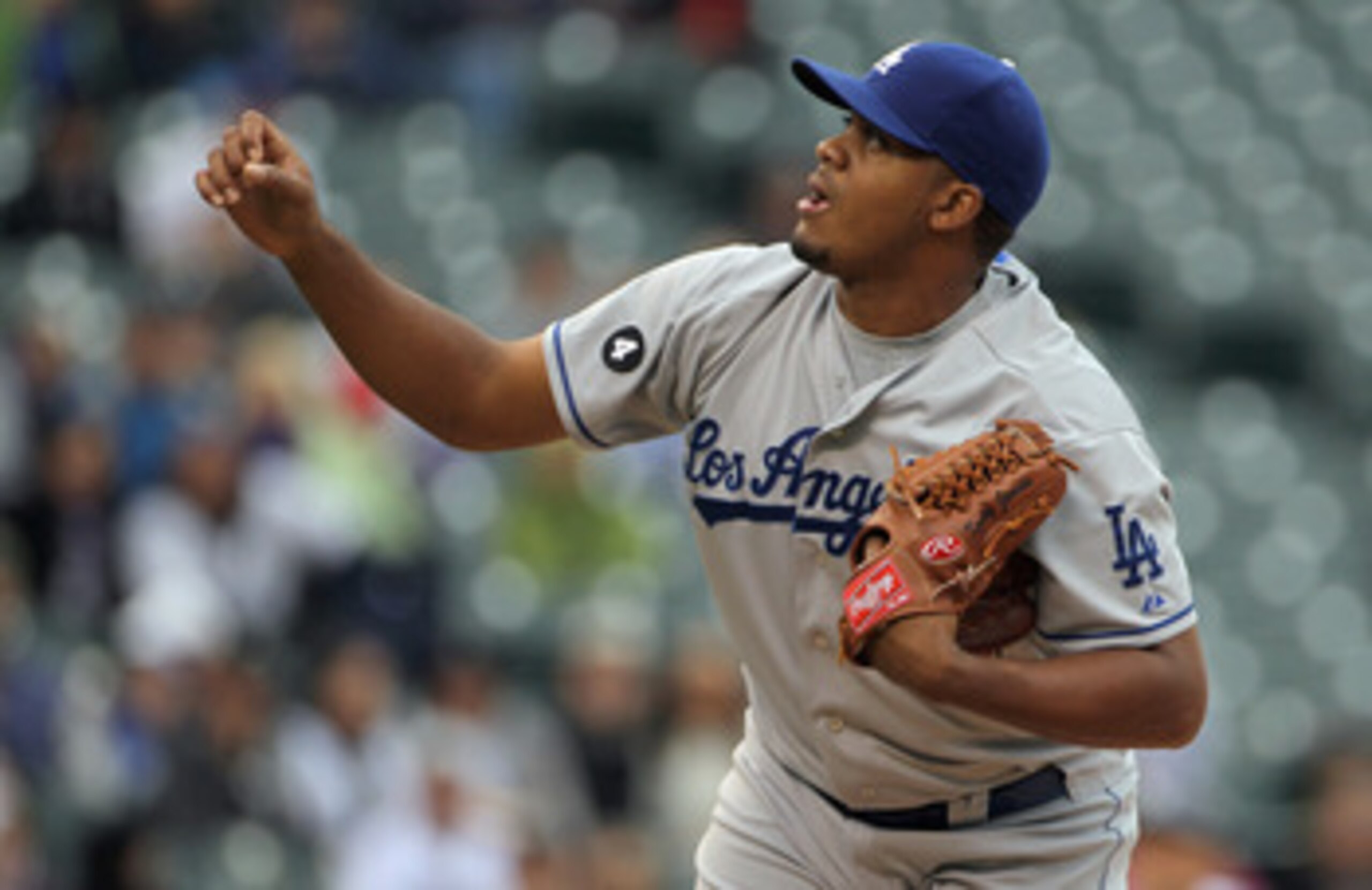 DENVER, CO - APRIL 06:  Relief pitcher Kenley Jansen #74 of the Los Angeles Dodgers works against the Colorado Rockies at Coors Field on April 6, 2011 in Denver, Colorado.  (Photo by Doug Pensinger/Getty Images)