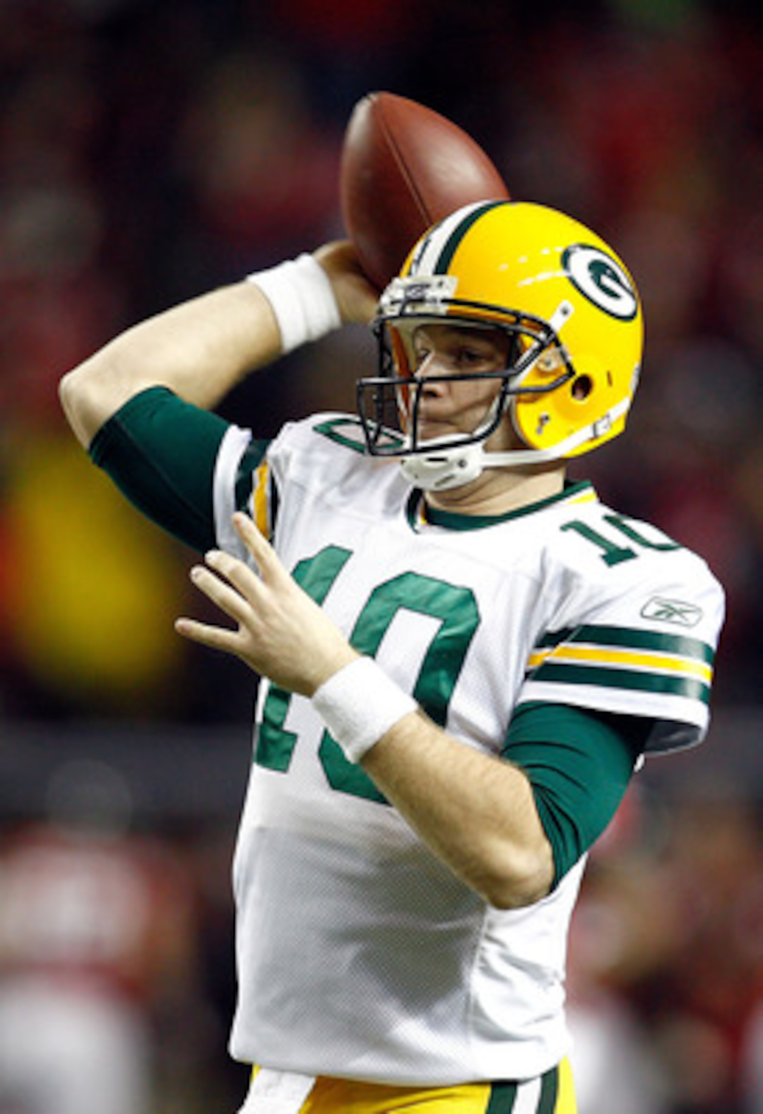 ATLANTA, GA - JANUARY 15:  Matt Flynn #10 of the Green Bay Packers losens up on the sideline against the Atlanta Falcons during their 2011 NFC divisional playoff game at Georgia Dome on January 15, 2011 in Atlanta, Georgia.  (Photo by Chris Graythen/Getty