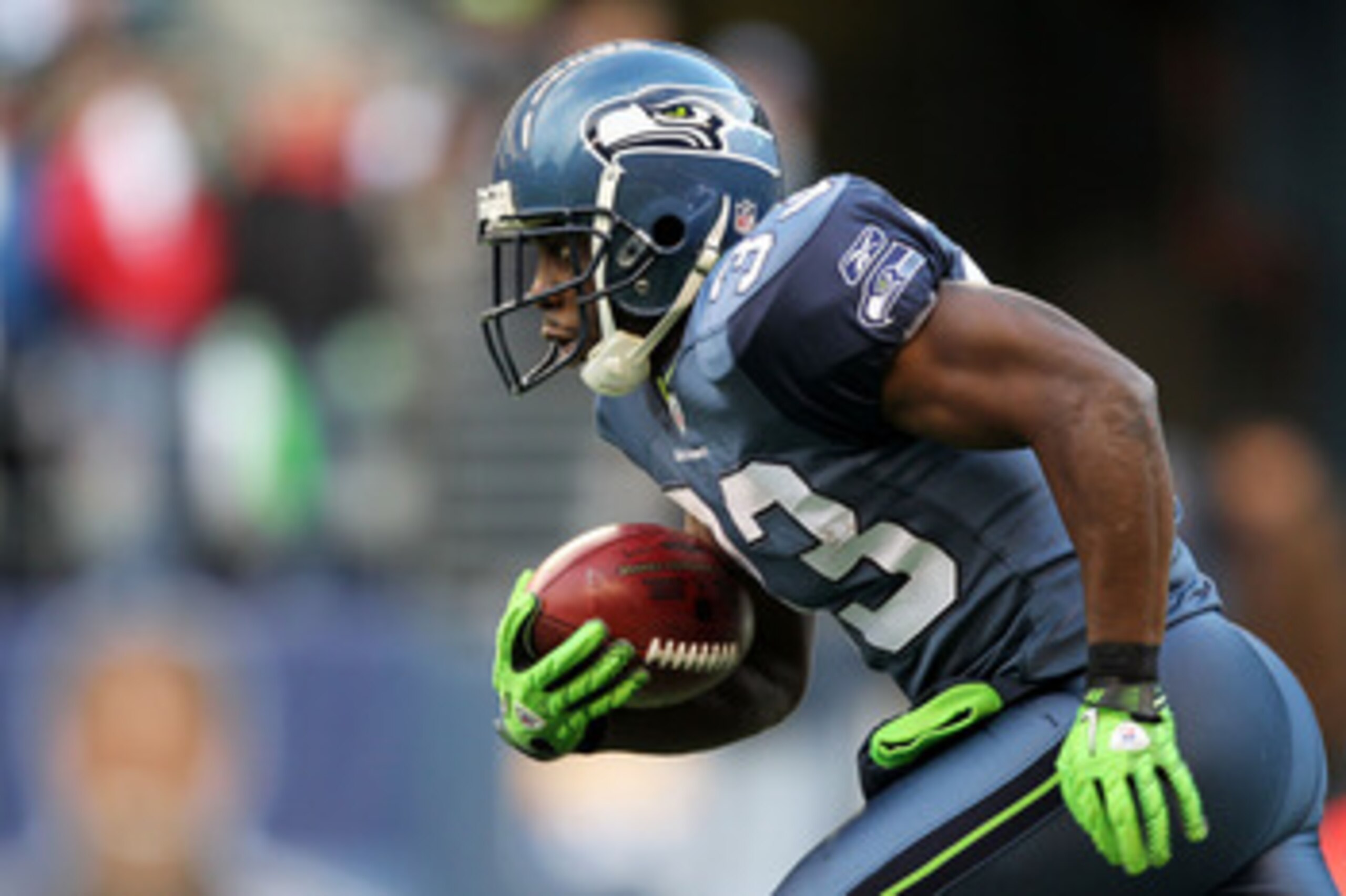 SEATTLE, WA - JANUARY 08:  Leon Washington #33 of the Seattle Seahawks runs down field against the New Orleans Saints during the 2011 NFC wild-card playoff game at Qwest Field on January 8, 2011 in Seattle, Washington.  (Photo by Otto Greule Jr/Getty Imag