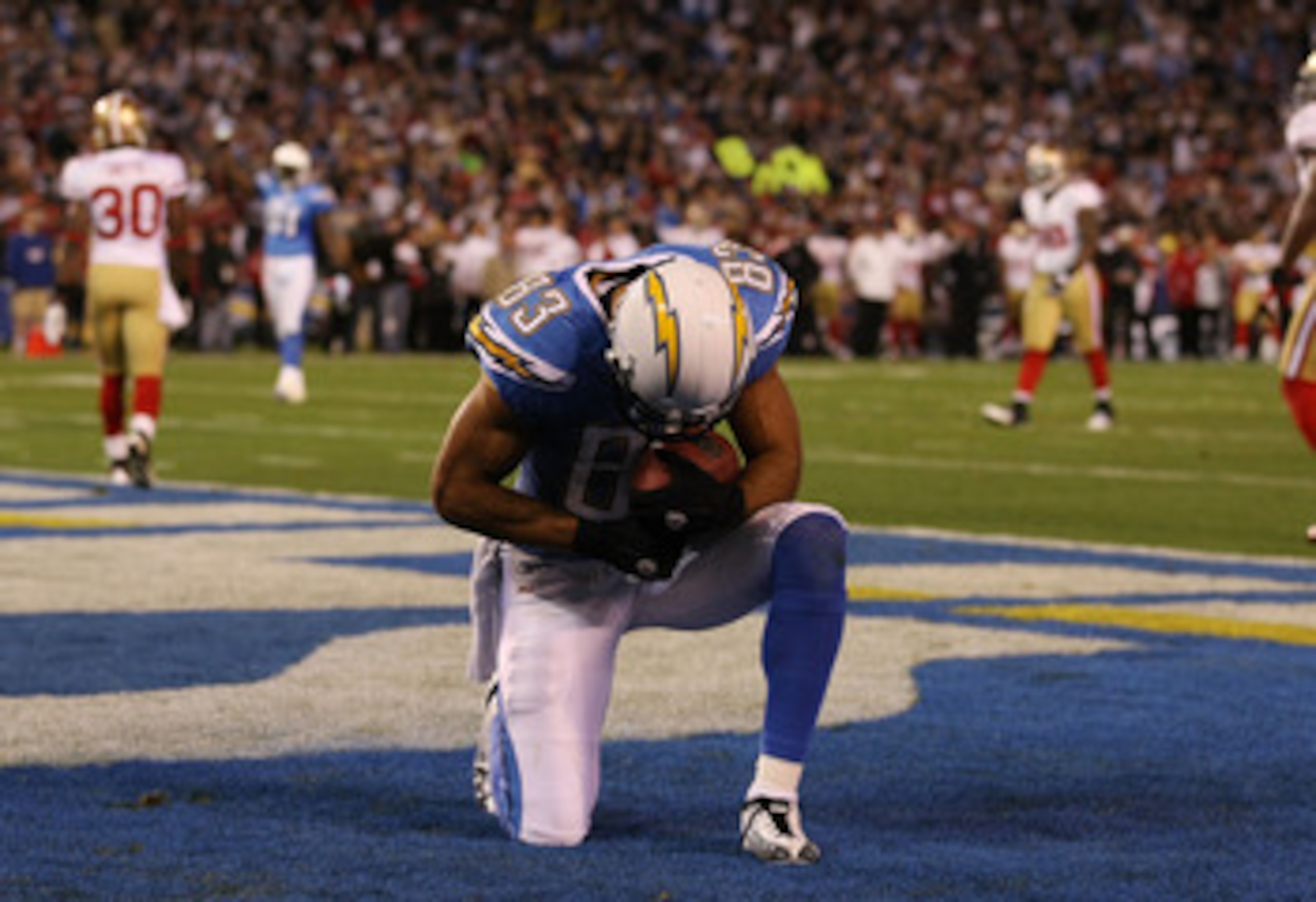 SAN DIEGO, CA - DECEMBER 16:  Wide receiver Vincent Jackson #83 of the San Diego Chargers celebrates scoring a touchdown in the second quarter against the San Francisco 49ers at Qualcomm Stadium on December 16, 2010 in San Diego, California.  (Photo by Do