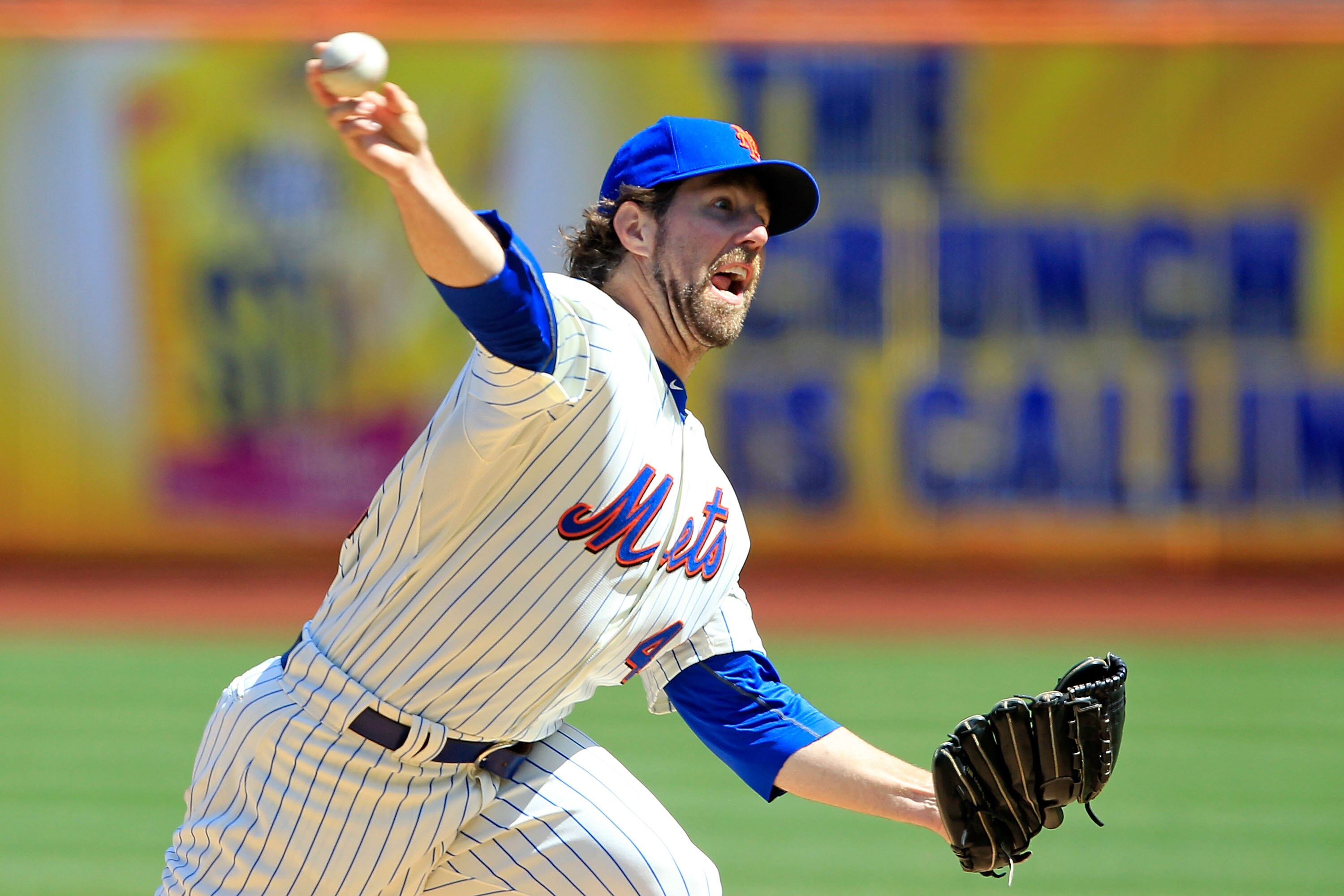 NEW YORK, NY - APRIL 14: R.A. Dickey #43 of the New York Mets pitches against the Colorado Rockies at Citi Field on April 14, 2011 in the Flushing neighborhood of the Queens borough of New York City.  (Photo by Chris Trotman/Getty Images)