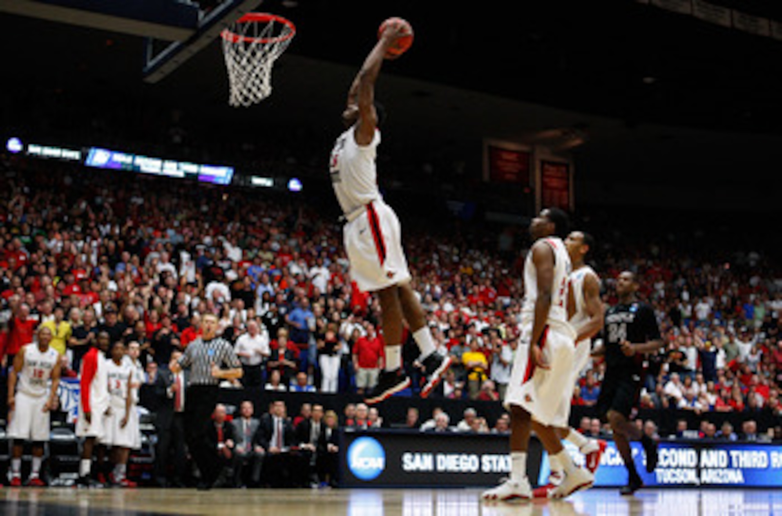 TUCSON, AZ - MARCH 19:  Kawhi Leonard #15 of the San Diego State Aztecs scores the final basket in double overtime against the Temple Owls in the third round of the 2011 NCAA men's basketball tournament at McKale Center on March 19, 2011 in Tucson, Arizon