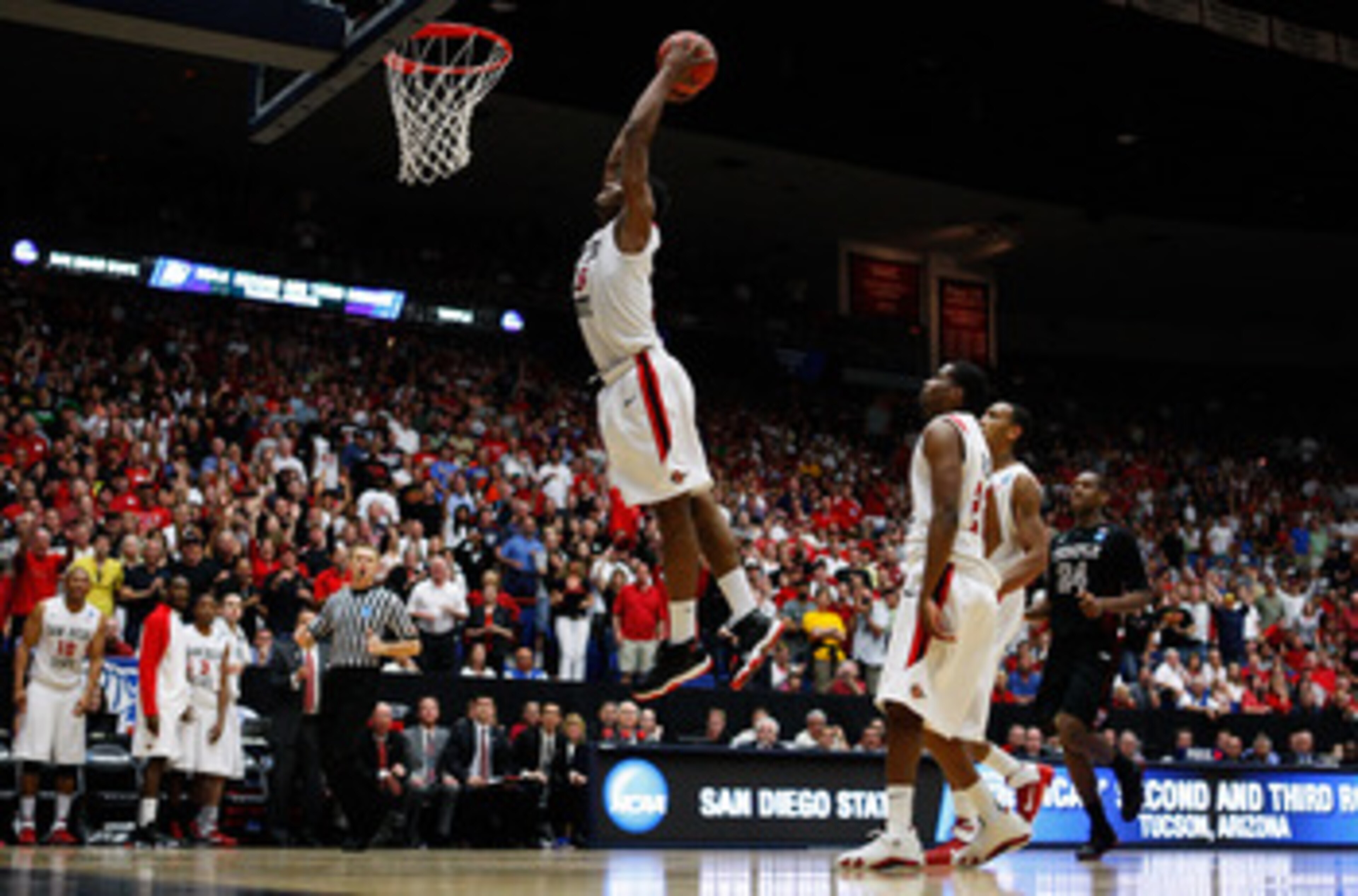 TUCSON, AZ - MARCH 19:  Kawhi Leonard #15 of the San Diego State Aztecs scores the final basket in double overtime against the Temple Owls in the third round of the 2011 NCAA men's basketball tournament at McKale Center on March 19, 2011 in Tucson, Arizon