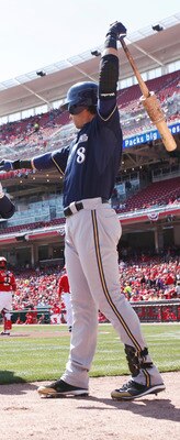 CINCINNATI, OH - APRIL 3: Rickie Weeks #23 of the Milwaukee Brewers celebrates with Ryan Braun #8 after hitting a home run to lead off the game against the Cincinnati Reds at Great American Ball Park on April 3, 2011 in Cincinnati, Ohio. The Reds won 12-3