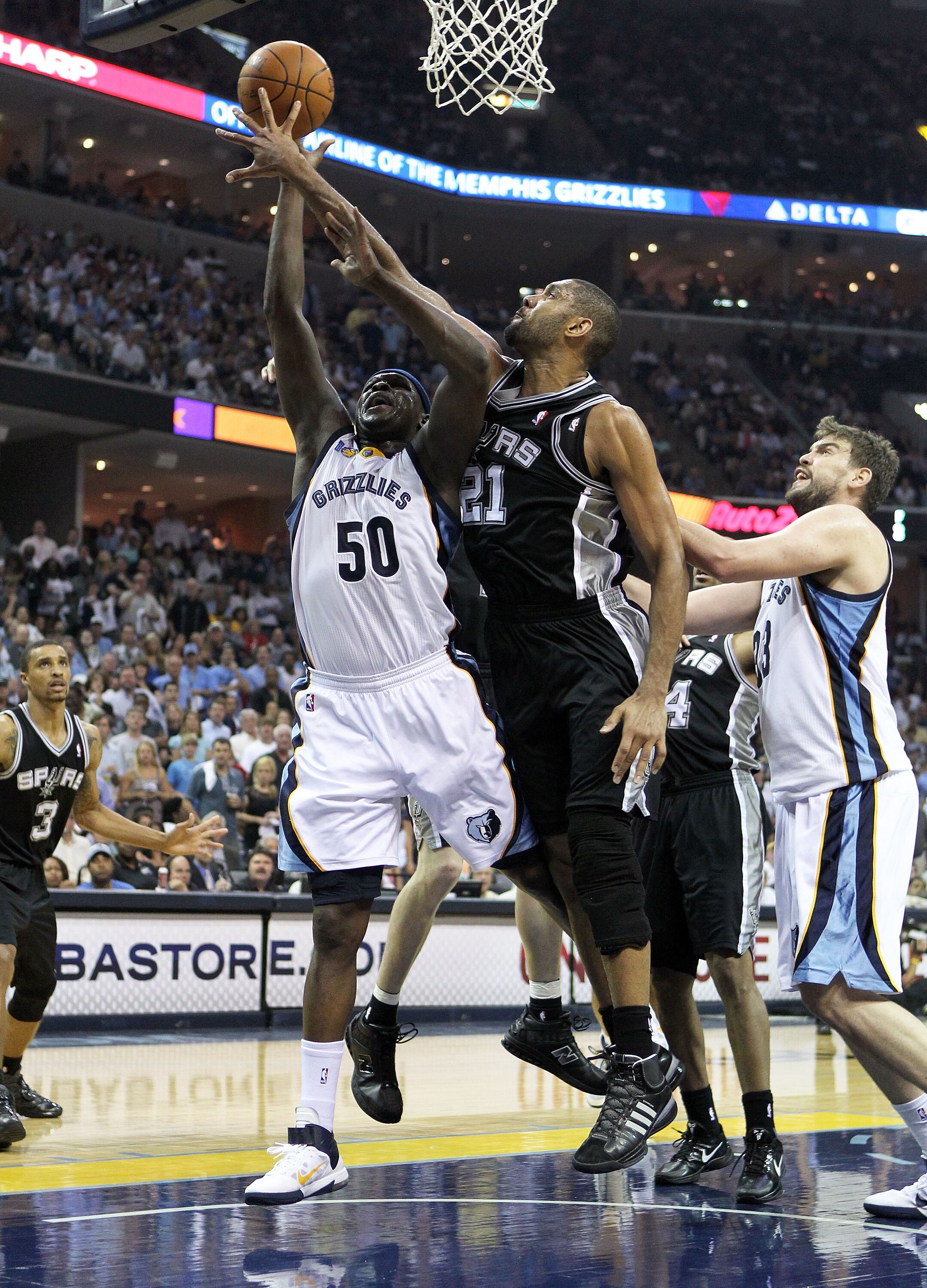 MEMPHIS, TN - APRIL 29: Zach Randolph #50 of the Memphis Grizzlies shoots the ball while defended by Tim Duncan #21 of the San Antonio Spurs during the Grizzlies 99-91 win over the Spurs  in Game Six of the Western Conference Quarterfinals in the 2011 NBA