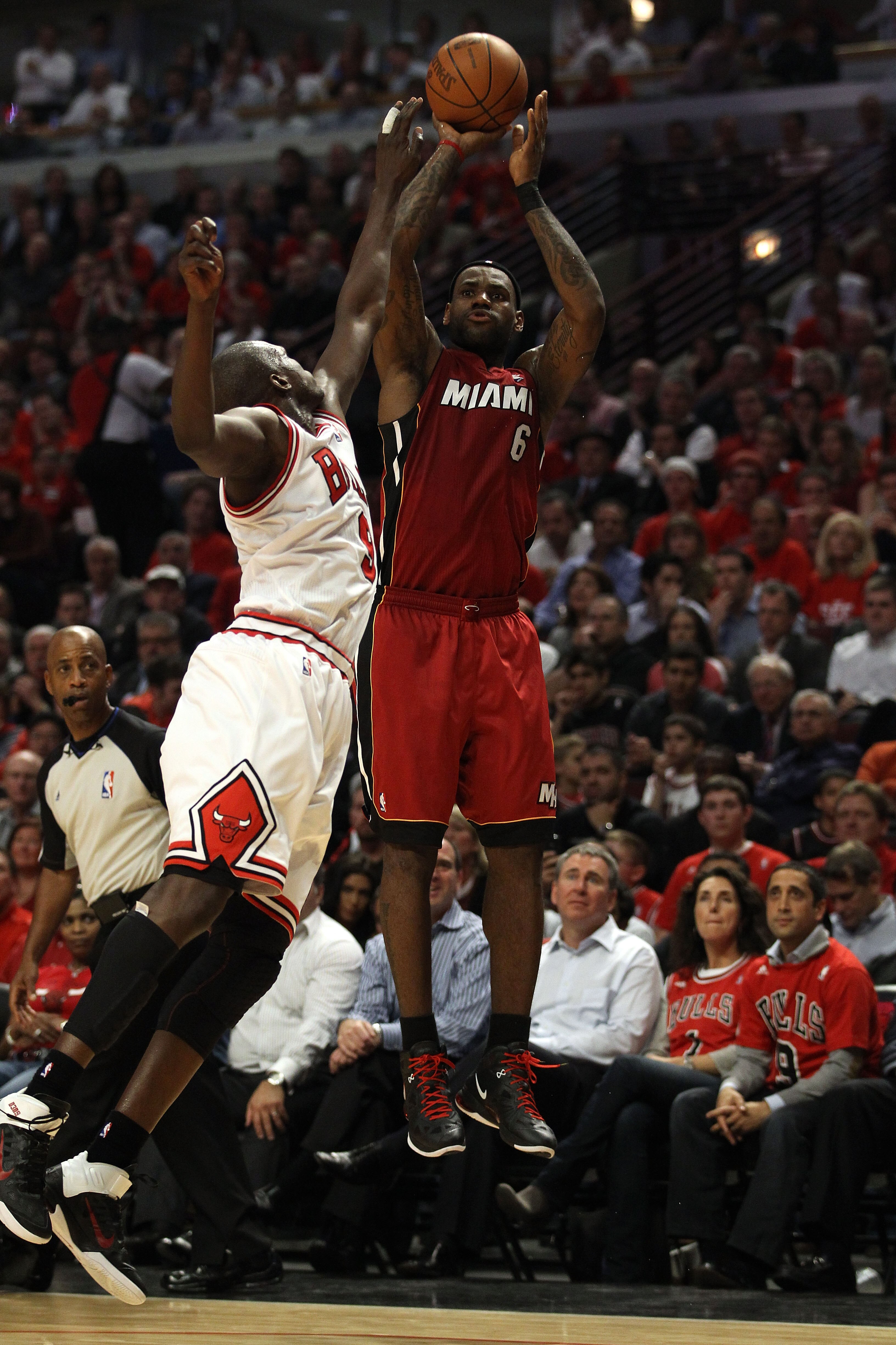 CHICAGO, IL - MAY 18:  LeBron James #6 of the Miami Heat attempts a shot against the Chicago Bulls in Game Two of the Eastern Conference Finals during the 2011 NBA Playoffs on May 18, 2011 at the United Center in Chicago, Illinois. The HEat won 85-75. NOT