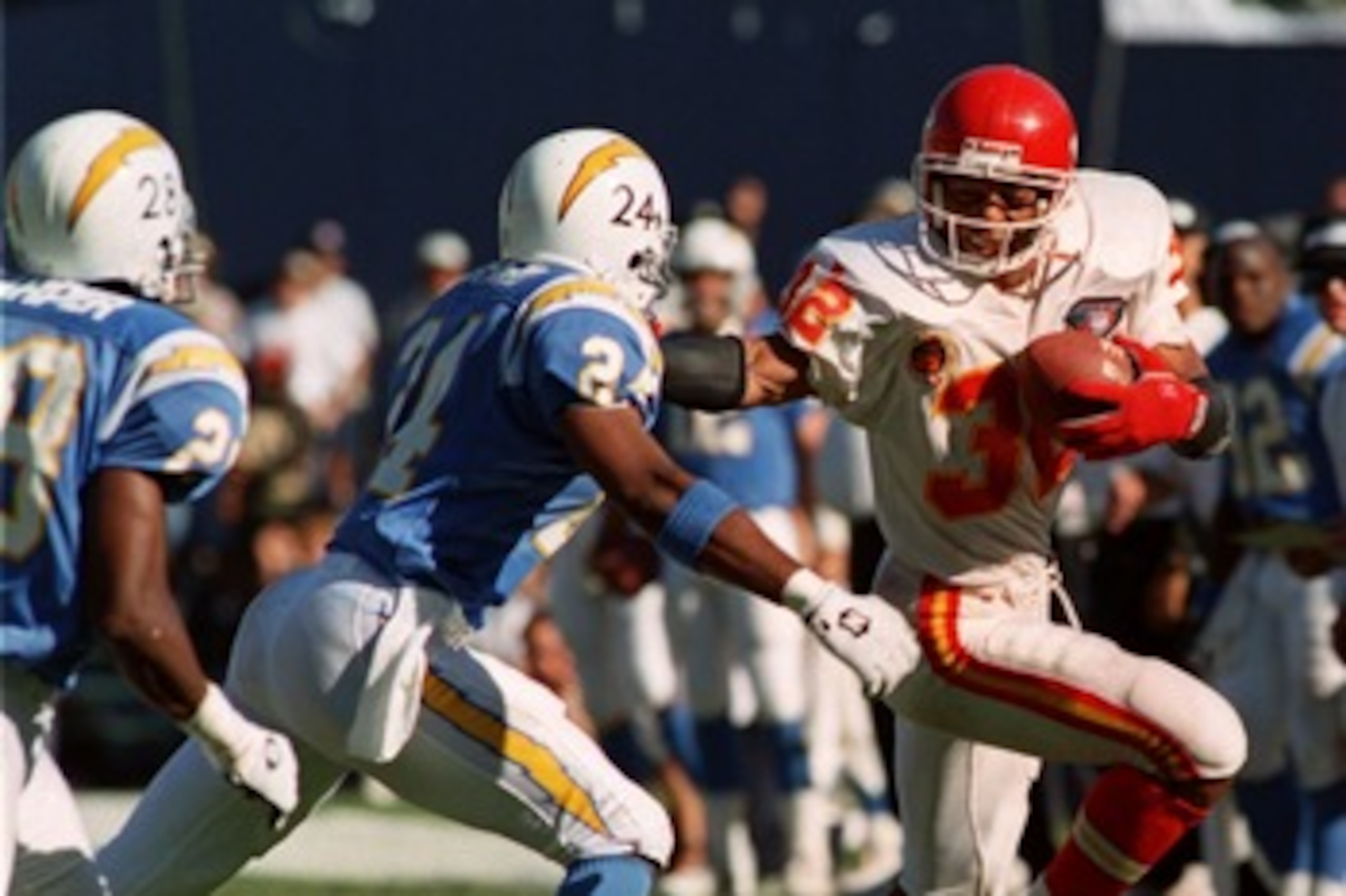 9 Oct 1994: KANSAS CITY''S MARCUS ALLEN, #32, IS CHASED OUT OF BOUNDS BY SAN DIEGO''S STANLEY RICHARD, #24, DURING THE FOURTH QUARTER OF THEIR MATCHUP AT JACK MURPHY STADIUM IN SAN DIEGO, CALIFORNIA.