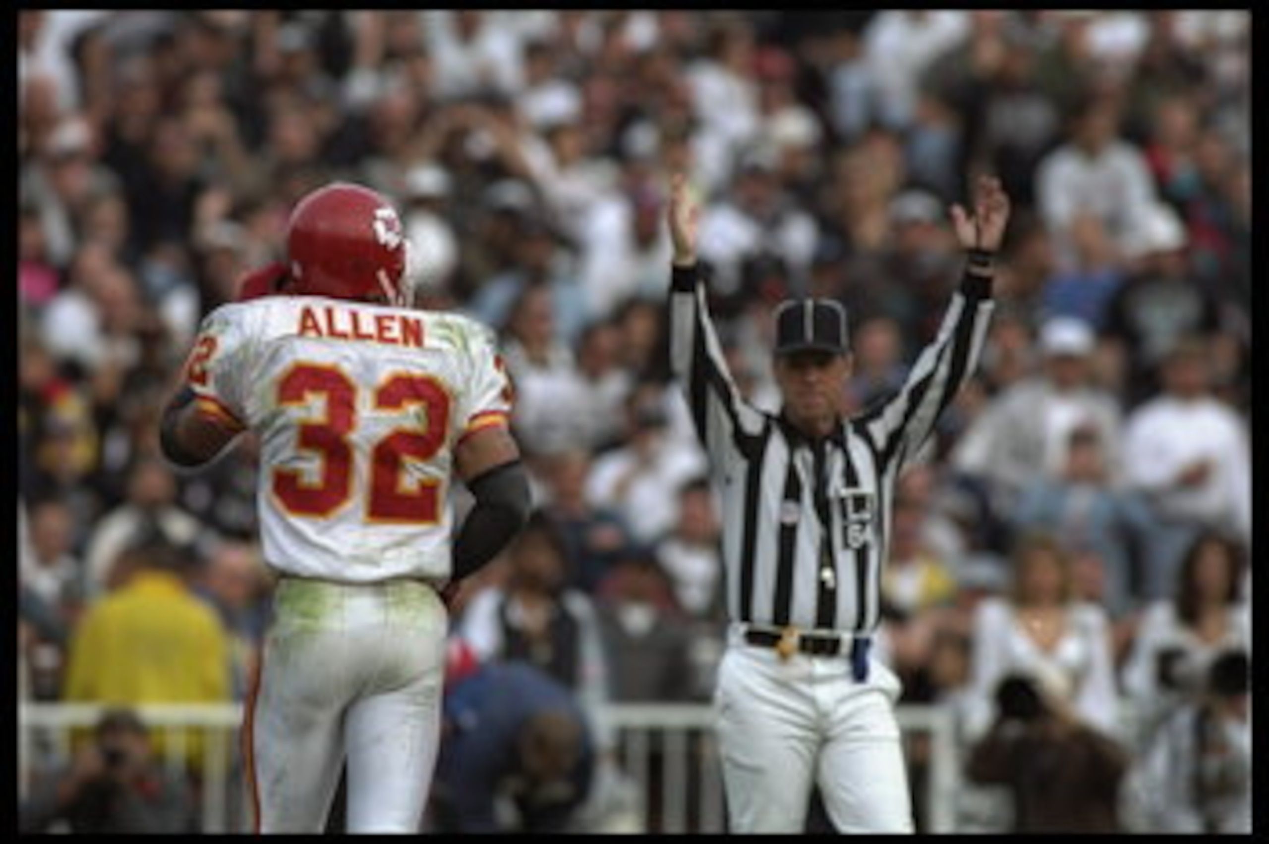 3 Dec 1995:  Running back Marcus Allen #32 of the Kansas City Chiefs scores yet another touchdown against the Oakland Raiders at Oakland Alameda Stadium in Oakland, California.  The Chiefs defeated the Raiders 29-23.    Mandatory Credit:  Al Bello/Allspor