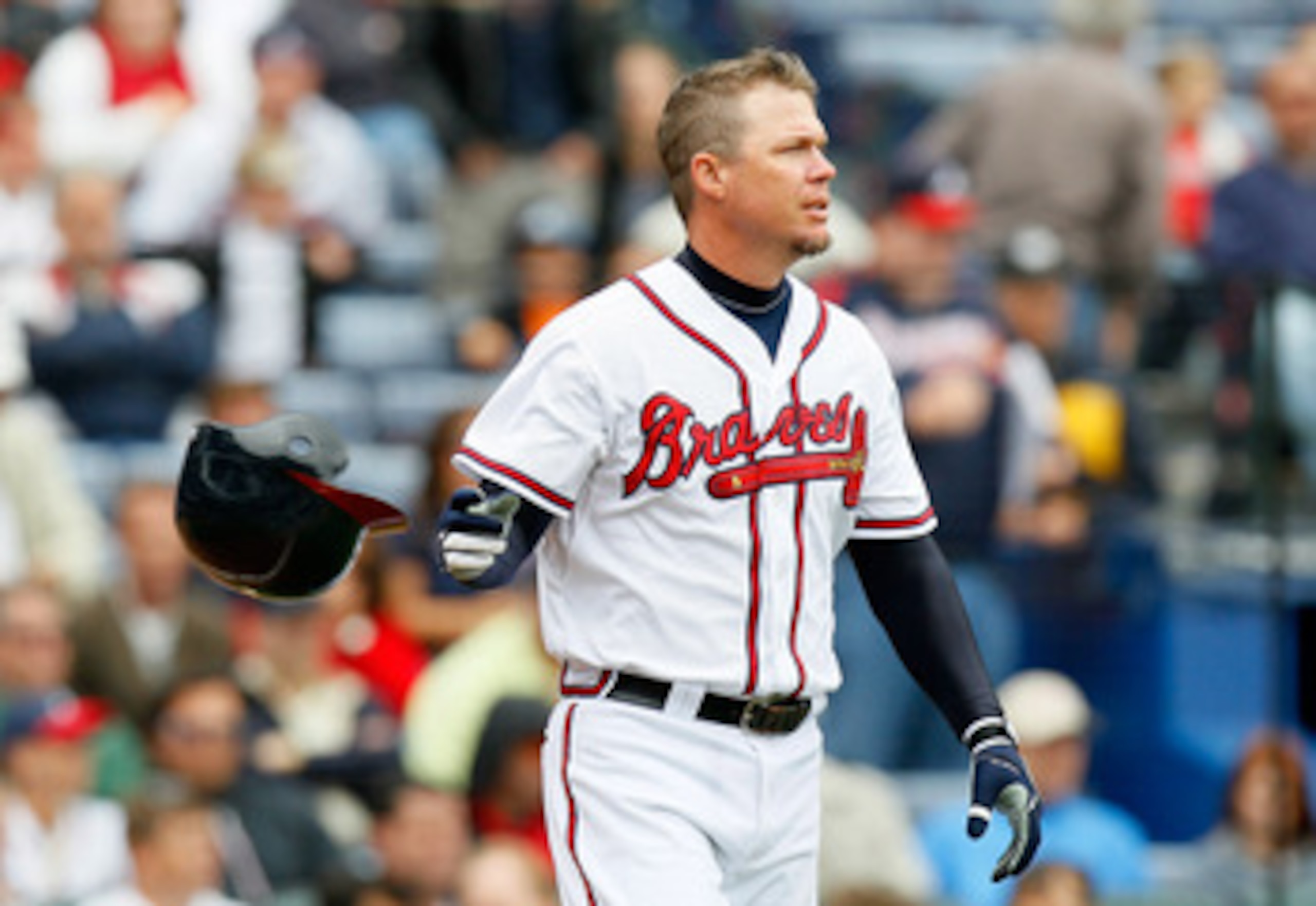 ATLANTA, GA - MAY 17:  Chipper Jones #10 of the Atlanta Braves tosses his helmet after striking out in the eighth inning against the Houston Astros at Turner Field on May 17, 2011 in Atlanta, Georgia.  (Photo by Kevin C. Cox/Getty Images)