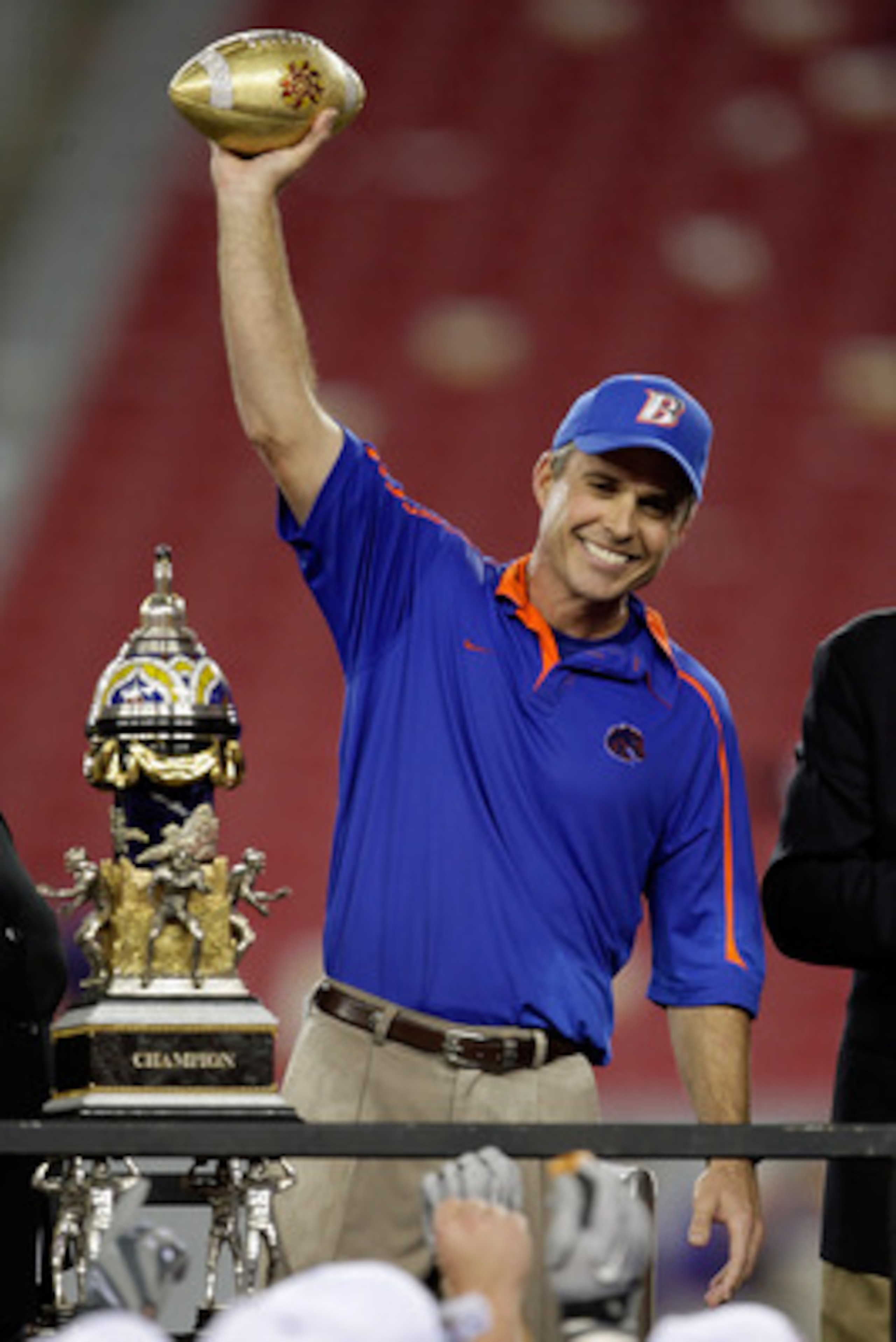 GLENDALE, AZ - JANUARY 04:  Head coach Chris Petersen of the Boise State Broncos celebrates after defeating the TCU Horned Frogs 17-10 during the Tostitos Fiesta Bowl at the Universtity of Phoenix Stadium on January 4, 2010 in Glendale, Arizona.  (Photo b