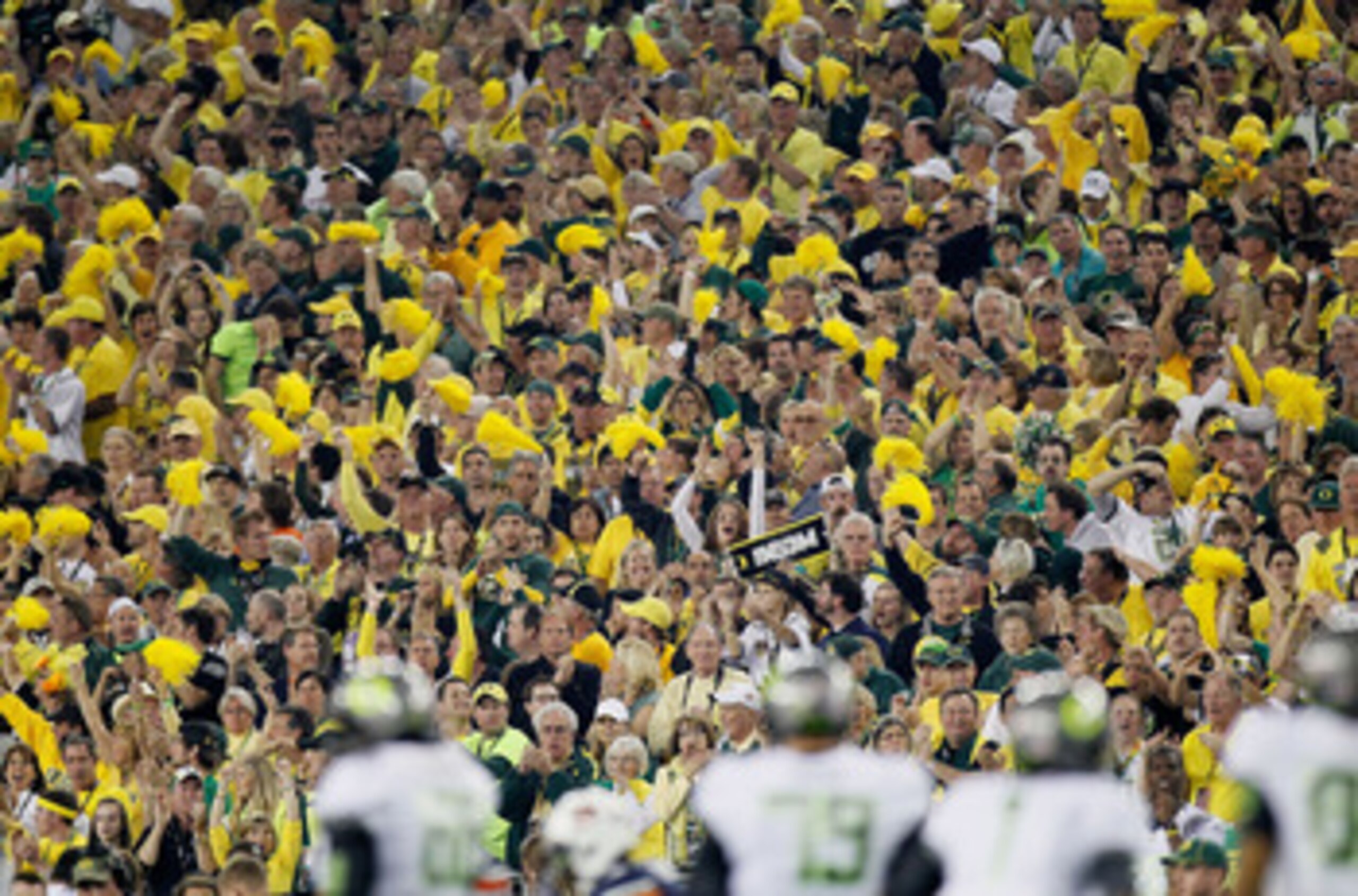 GLENDALE, AZ - JANUARY 10:  Oregon Ducks fans attend their Tostitos BCS National Championship Game against the Auburn Tigers at University of Phoenix Stadium on January 10, 2011 in Glendale, Arizona.  (Photo by Kevin C. Cox/Getty Images)