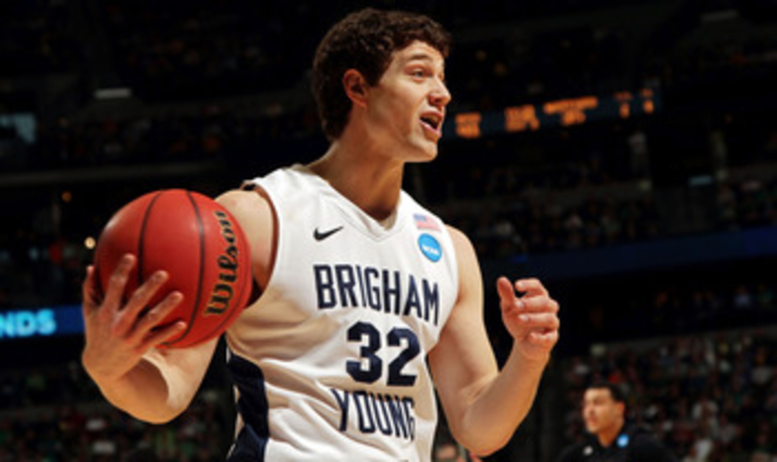 DENVER, CO - MARCH 17:  Jimmer Fredette #32 of the Brigham Young Cougars reacts to a call while playing against the Wofford Terriers during the second round of the 2011 NCAA men's basketball tournament at Pepsi Center on March 17, 2011 in Denver, Colorado