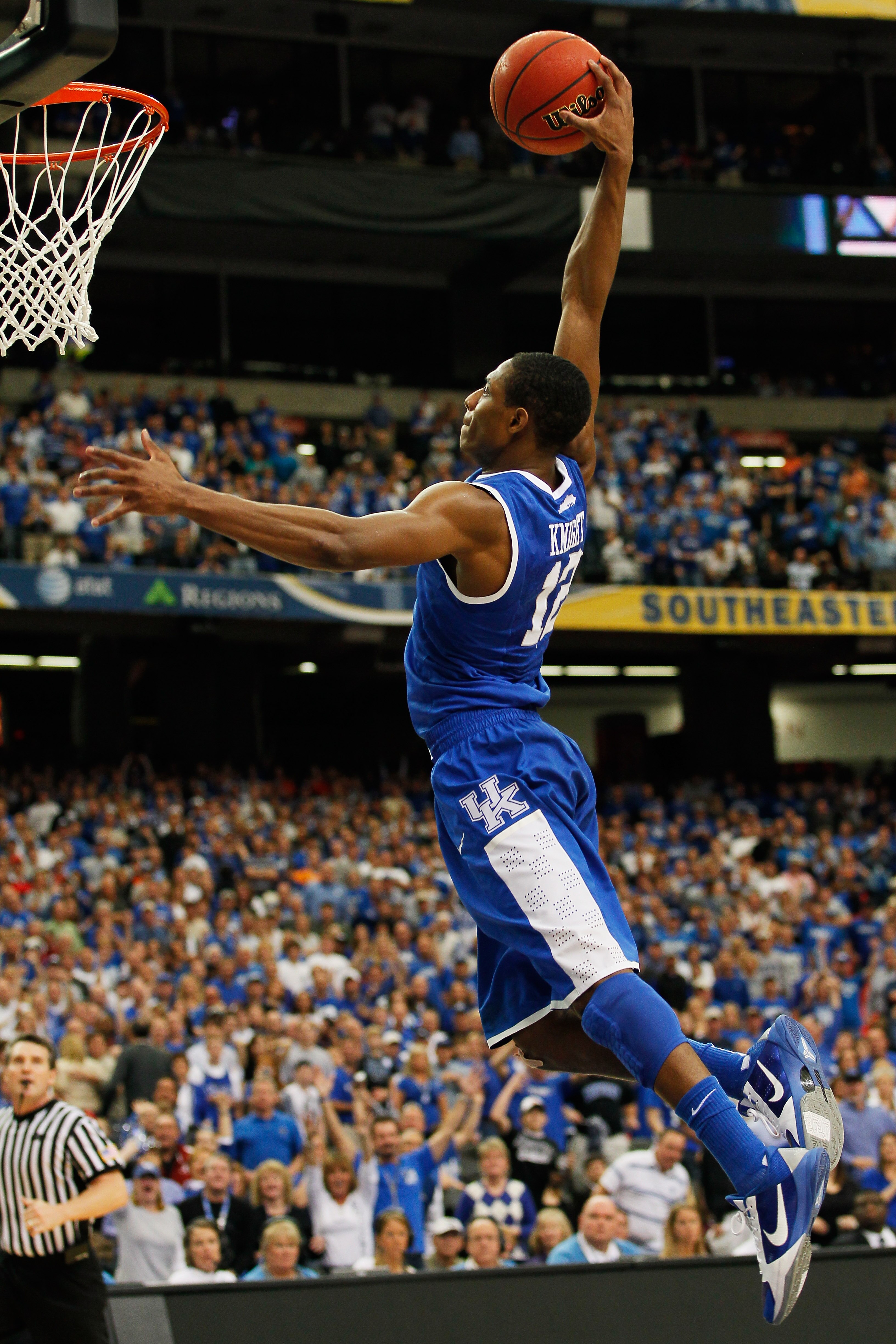 ATLANTA, GA - MARCH 13:  Brandon Knight #12 of the Kentucky Wildcats dunks on the Florida Gators during the championship game of the SEC Men's Basketball Tournament at Georgia Dome on March 13, 2011 in Atlanta, Georgia.  (Photo by Kevin C. Cox/Getty Image