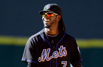 HOUSTON - MAY 14:  Shortstop Jose Reyes #7 of the New York Mets smiles at his bench after he intentionally dropped a soft line drive trying to double off Brett Wallace #2 of the Houston Astros in the seventh inning at Minute Maid Park on May 14, 2011 in H