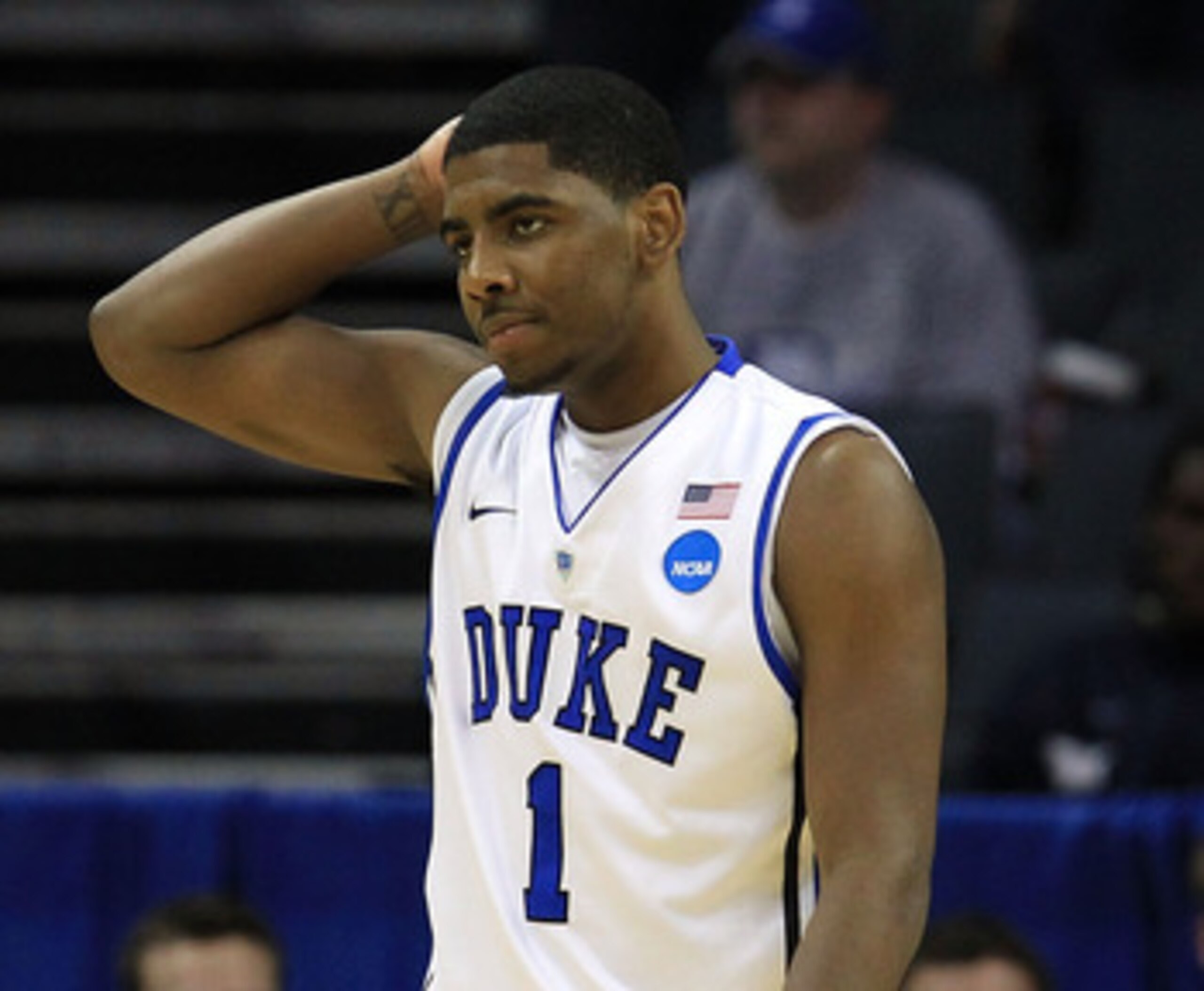 CHARLOTTE, NC - MARCH 20:  Kyrie Irving #1 looks over at teammate Seth Curry #30 of the Duke Blue Devils while taking on the Michigan Wolverines during the third round of the 2011 NCAA men's basketball tournament at Time Warner Cable Arena on March 20, 20