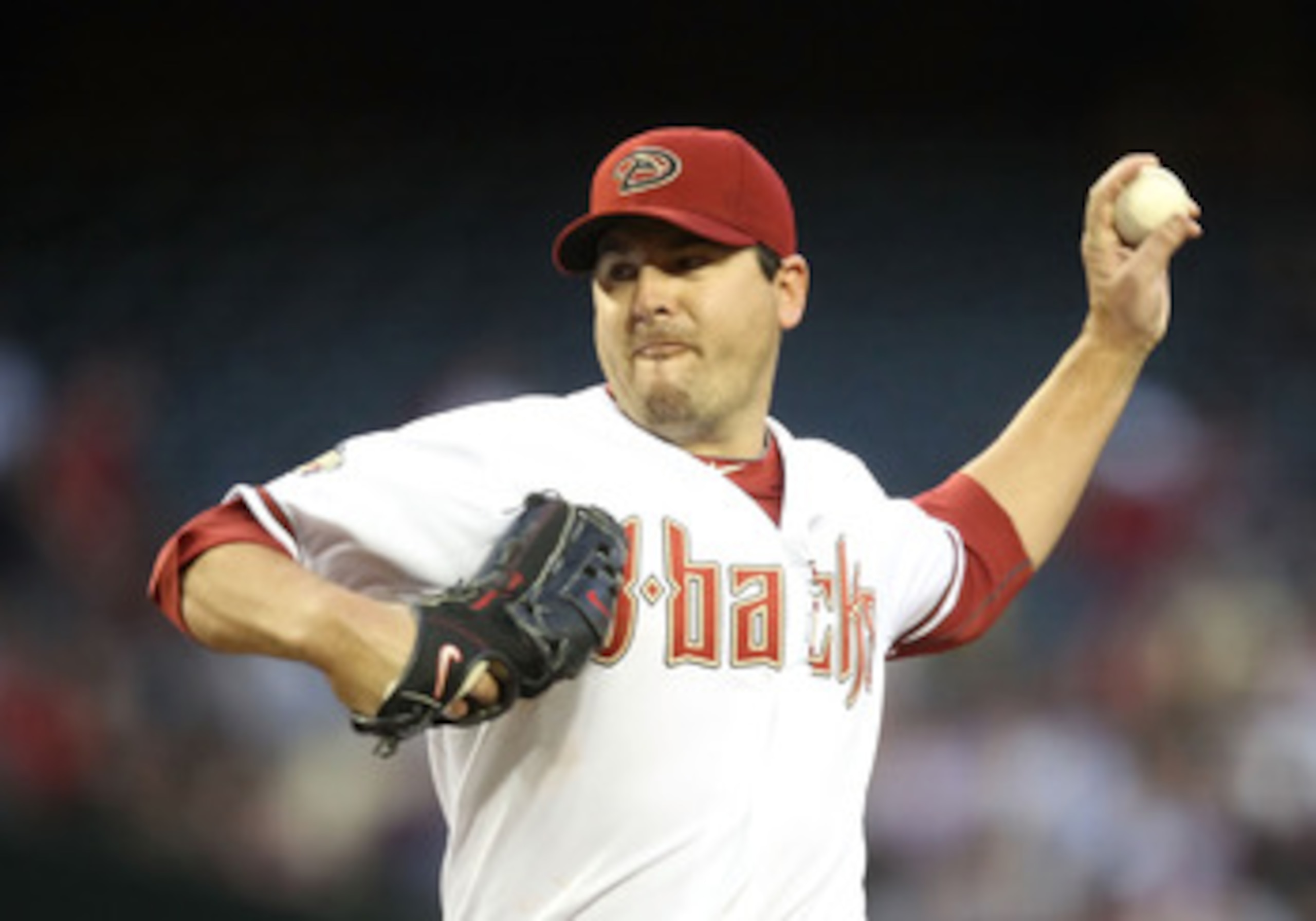PHOENIX, AZ - MAY 03:  Starting pitcher Joe Saunders #34 of the Arizona Diamondbacks pitches against the Colorado Rockies during the Major League Baseball game at Chase Field on May 3, 2011 in Phoenix, Arizona.  The Diamondbacks defeated the Rockies 4-3.