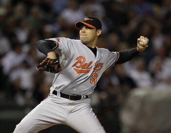 CHICAGO - AUGUST 25: Michael Gonzalez #51 of the Baltimore Orioles pitches against the Chicago White Sox at U.S. Cellular Field on August 25, 2010 in Chicago, Illinois. The Orioles defeated the White Sox 4-2. (Photo by Jonathan Daniel/Getty Images)