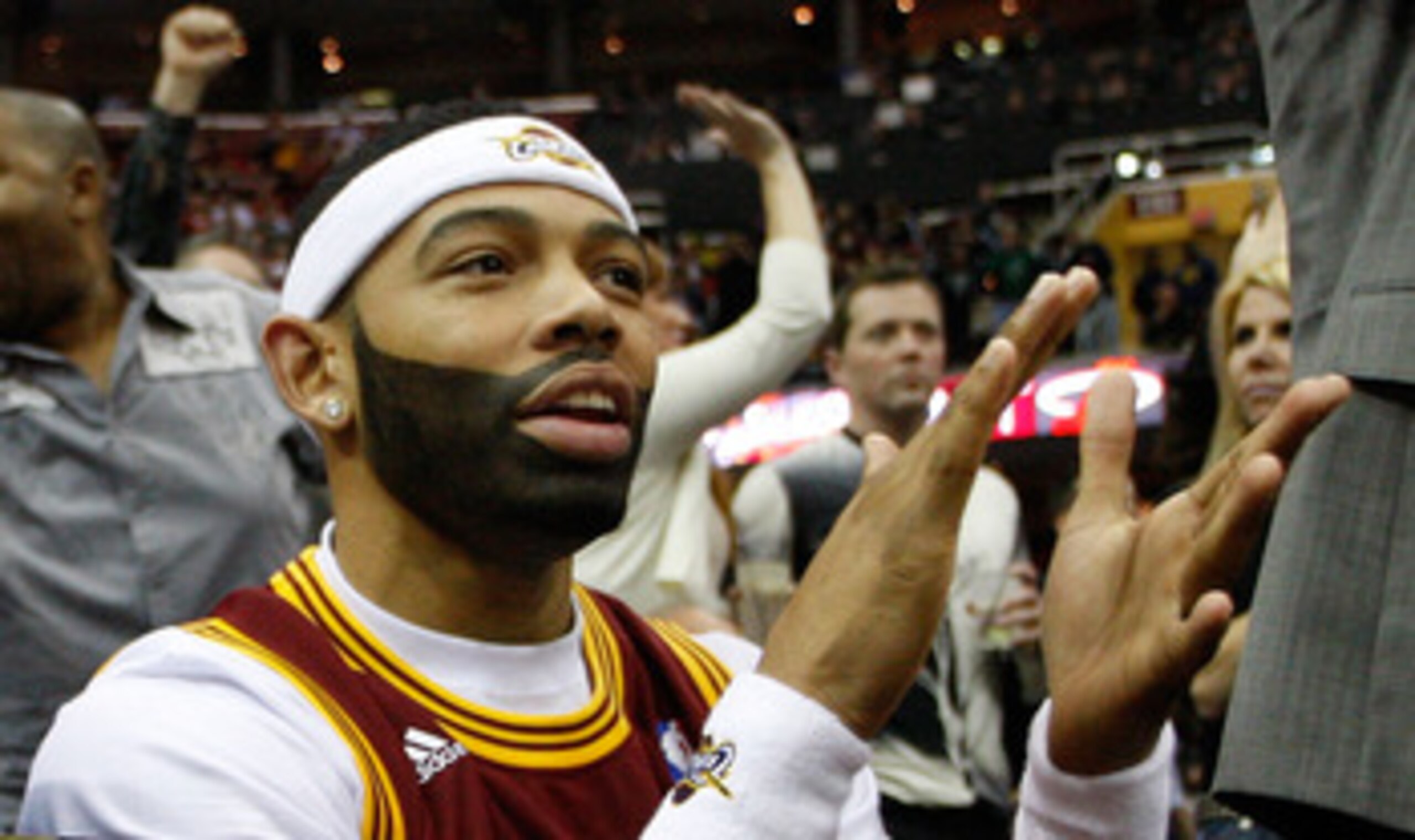 CLEVELAND - MARCH 29: Joe Haden of the Cleveland Browns cheers on the Cleveland Cavaliers during the game against the Miami Heat on March 29, 2011 at Quicken Loans Arena in Cleveland, Ohio. NOTE TO USER: User expressly acknowledges and agrees that, by dow