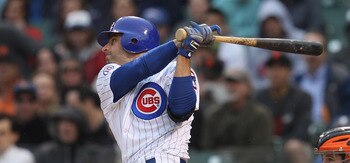 CHICAGO, IL - MAY 13: Reed Johnson #5 of the Chicago Cubs hits a run-scoring triple in the 7th inning against the San Francisco Giants at Wrigley Field on May 13, 2011 in Chicago, Illinois. The Cubs defeated the Giants 11-4. (Photo by Jonathan Daniel/Gett