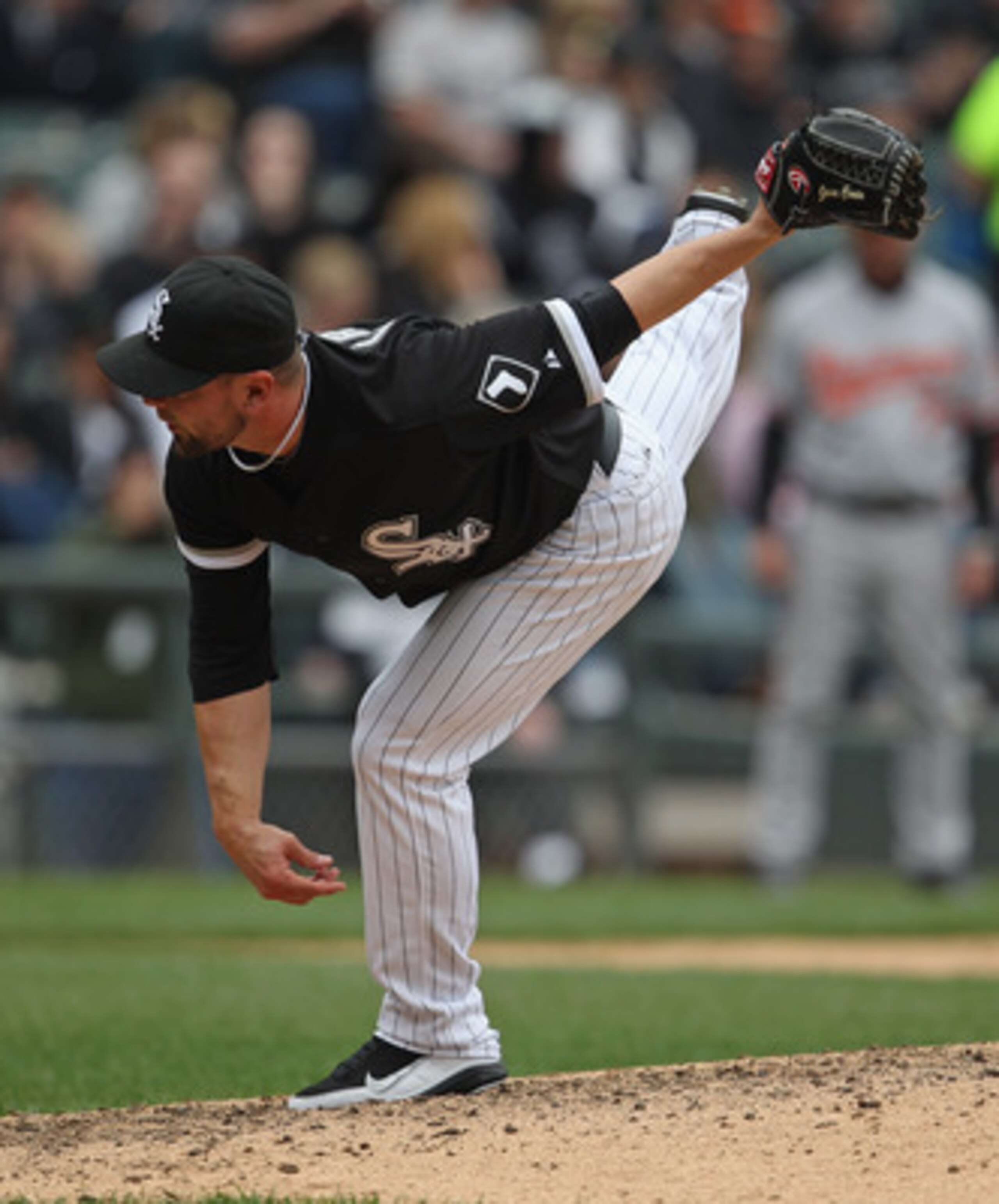 CHICAGO, IL - MAY 01: Jesse Crain #26 of the Chicago White Sox pitches against the Baltimore Orioles at U.S. Cellular Field on May 1, 2011 in Chicago, Illinois. The Orioles defeated the White Sox 6-4. (Photo by Jonathan Daniel/Getty Images)