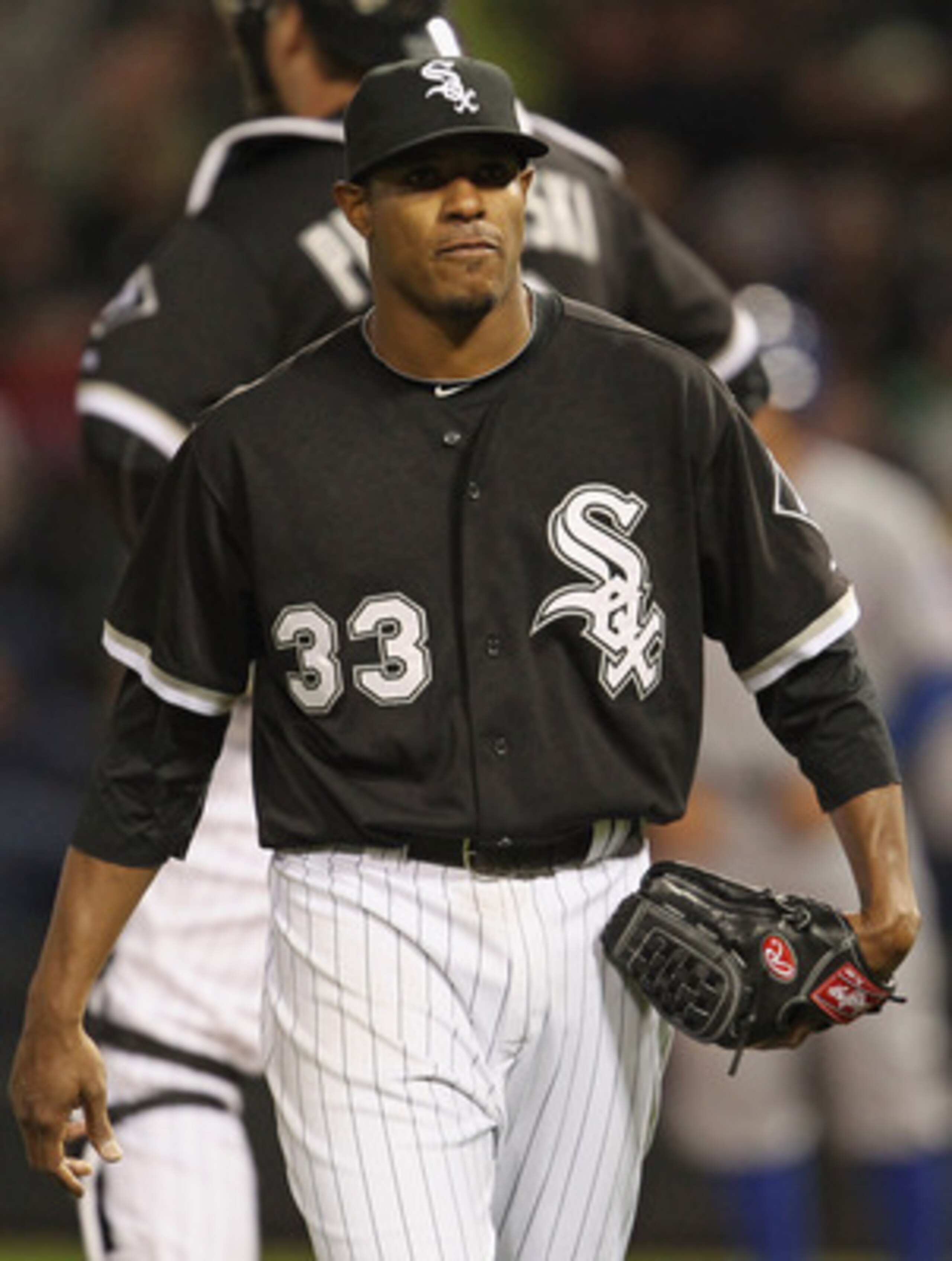 CHICAGO, IL - MAY 16: Starting pitcher Edwin Jackson #33 of the Chicago White Sox walks to the dugout after being taken out of a game against the Texas Rangers at U.S. Cellular Field on May 16, 2011 in Chicago, Illinois. The Rangers defeated the White Sox