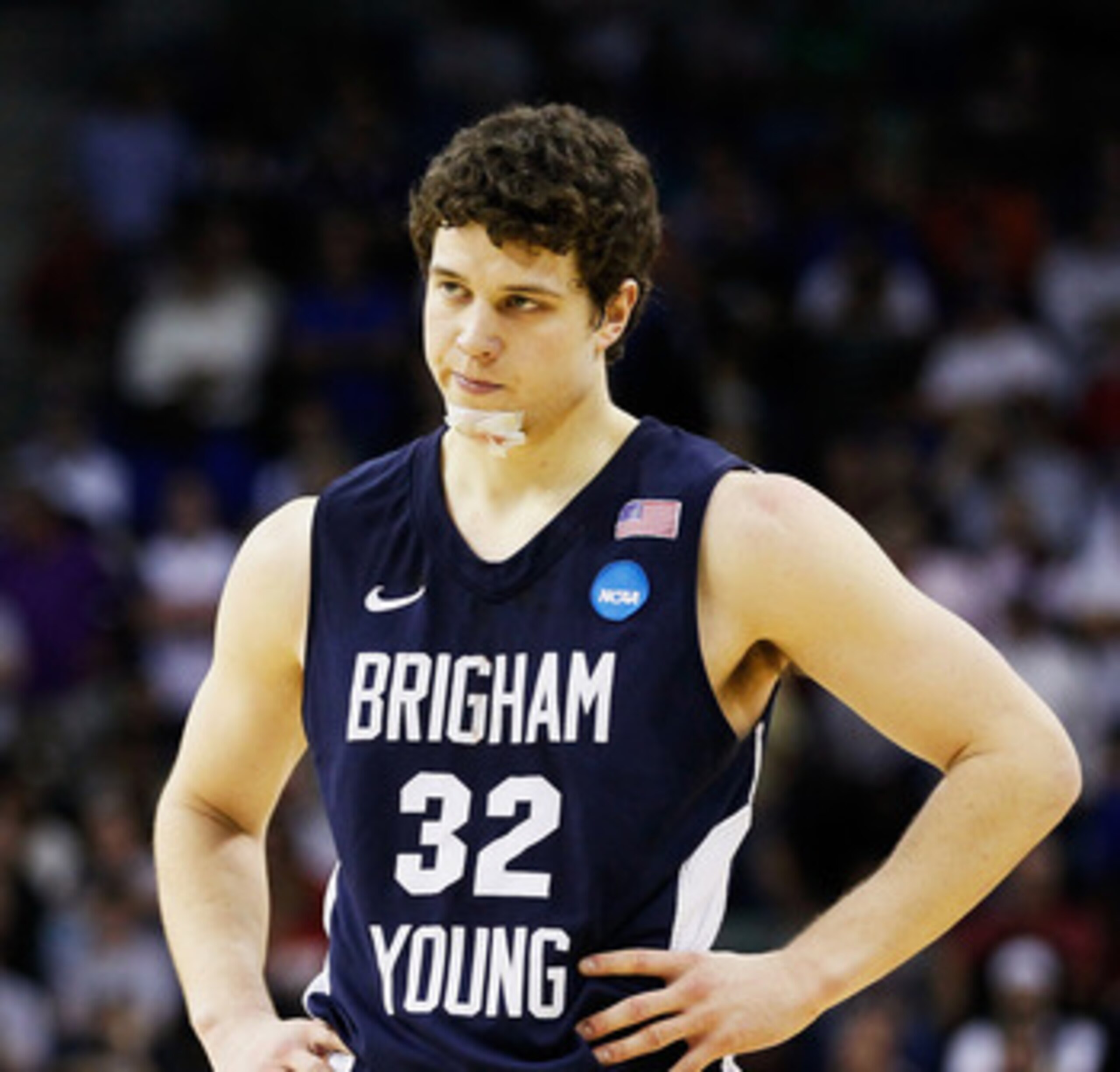 NEW ORLEANS, LA - MARCH 24:  Jimmer Fredette #32 of the Brigham Young Cougars reacts during their 74 to 83 loss to the Florida Gators in the Southeast regional of the 2011 NCAA men's basketball tournament at New Orleans Arena on March 24, 2011 in New Orle