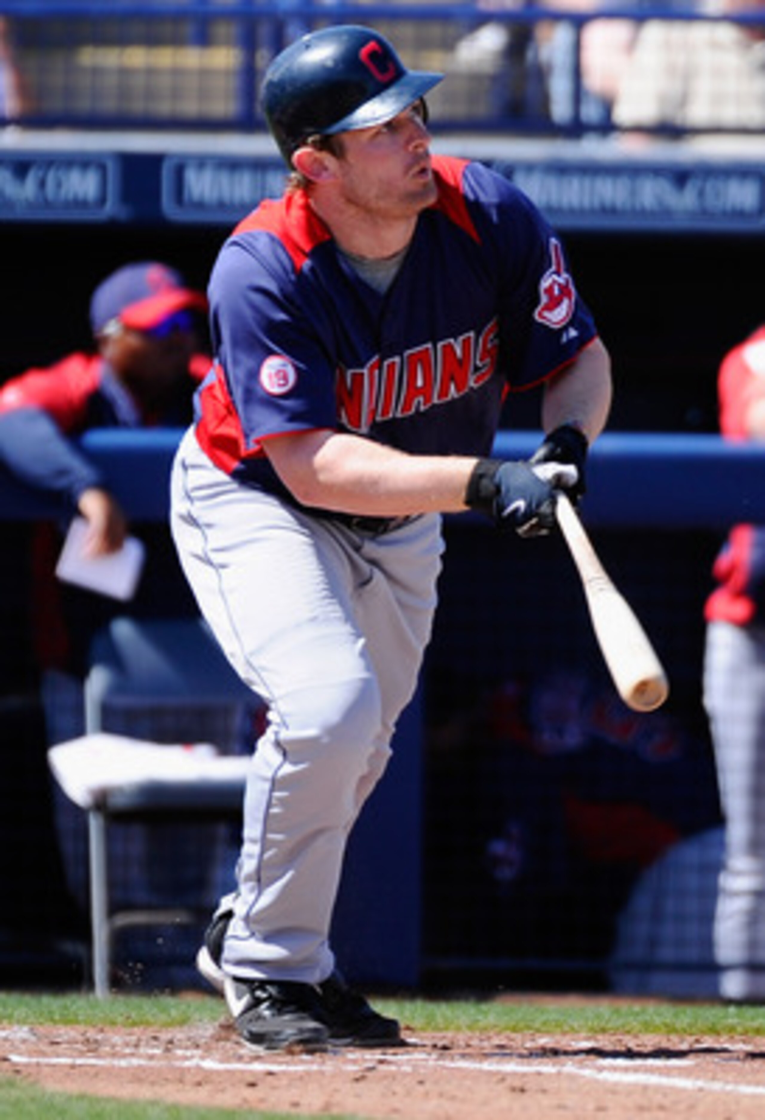 PEORIA, AZ - MARCH 13:  Austin Kearns #26 of the Cleveland Indians hits a double against the San Diego Padres during the second inning of the spring training baseball game at Peoria Stadium on March 13, 2011 in Peoria, Arizona.  (Photo by Kevork Djansezia