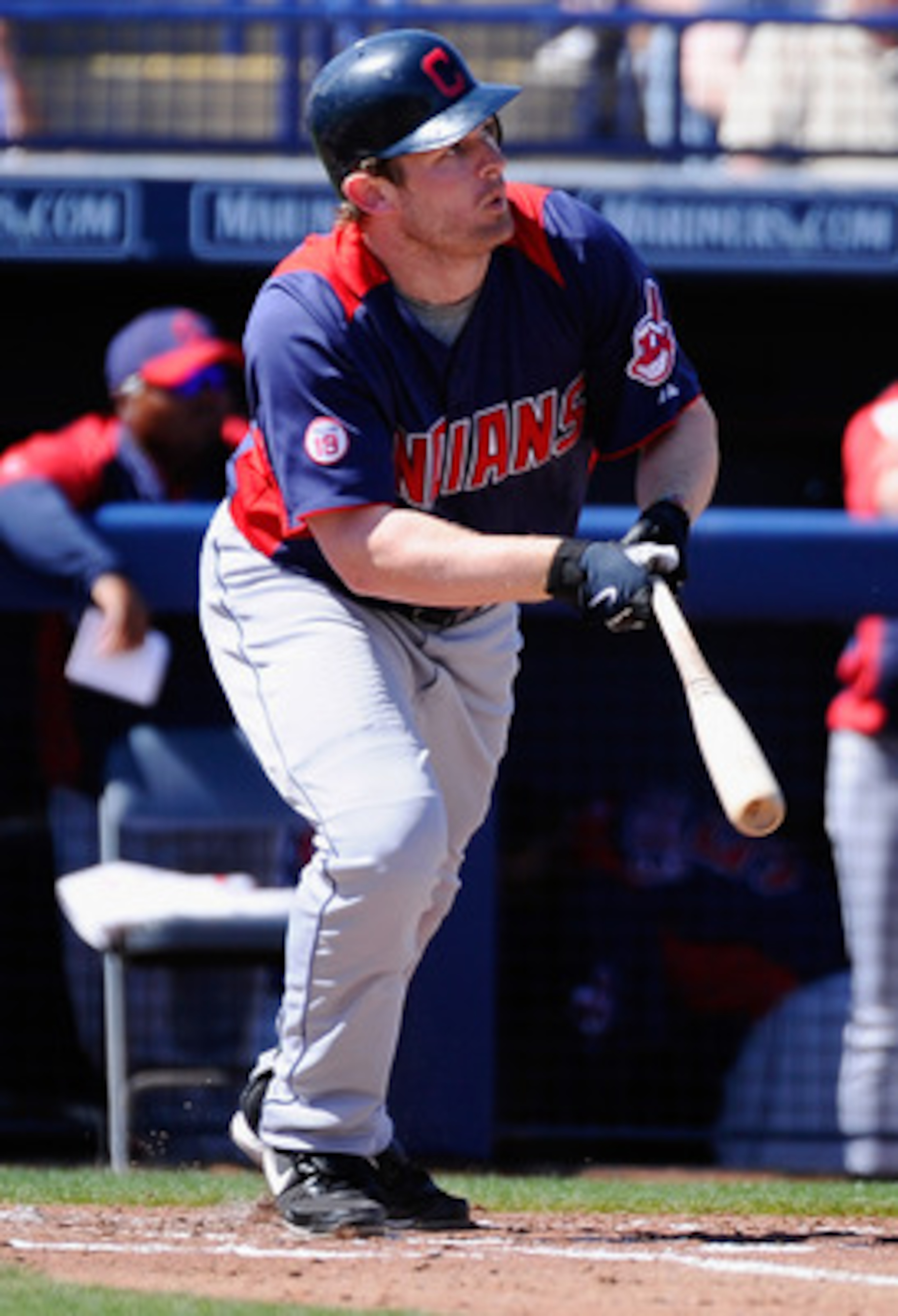 PEORIA, AZ - MARCH 13:  Austin Kearns #26 of the Cleveland Indians hits a double against the San Diego Padres during the second inning of the spring training baseball game at Peoria Stadium on March 13, 2011 in Peoria, Arizona.  (Photo by Kevork Djansezia