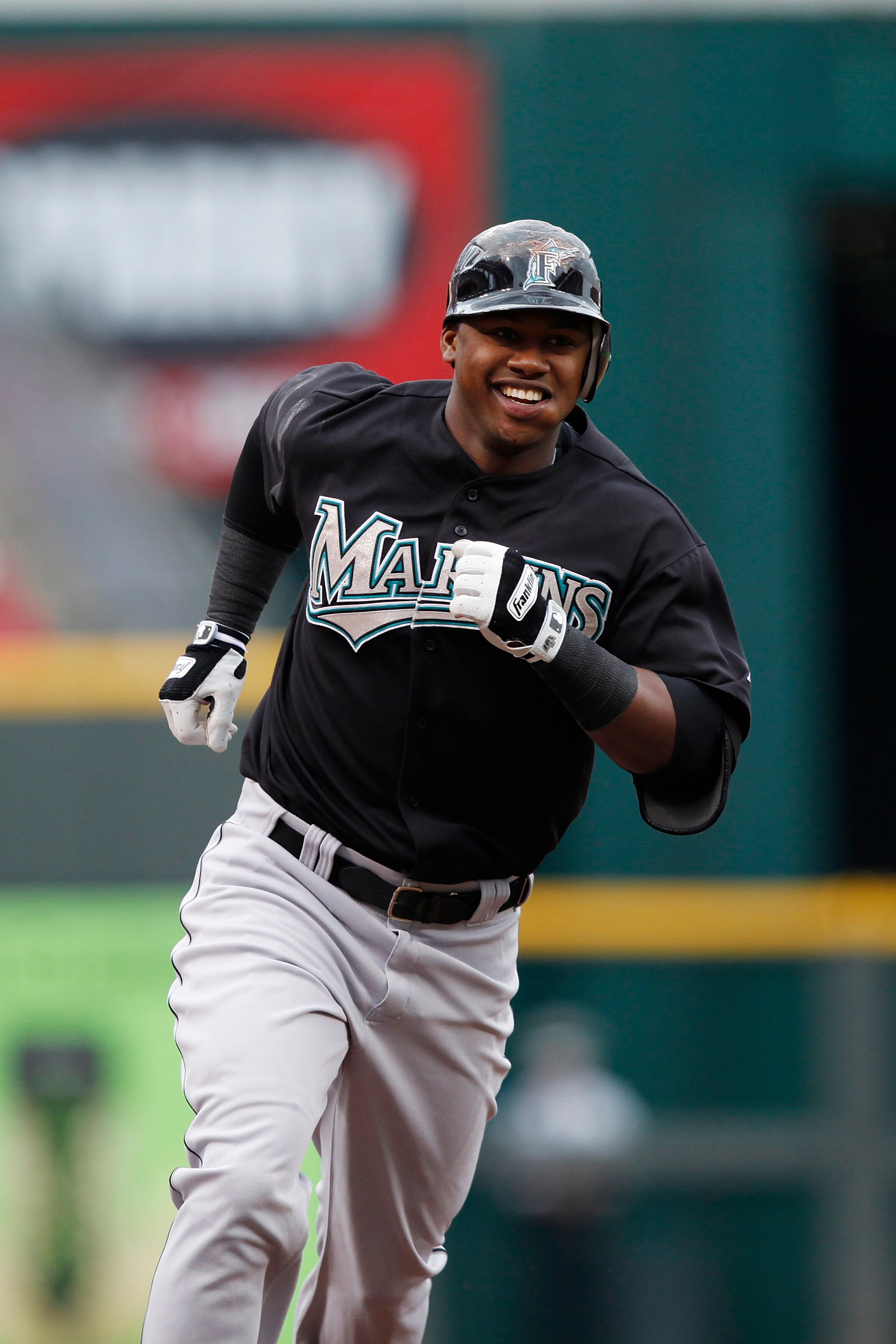 CINCINNATI, OH - MAY 1: Hanley Ramirez #2 of the Florida Marlins rounds the bases after hitting a home run in the first inning against the Cincinnati Reds at Great American Ball Park on May 1, 2011 in Cincinnati, Ohio. The Marlins defeated the Reds 9-5. CINCINNATI, OH - MAY 1: Hanley Ramirez #2 of the Florida Marlins rounds the bases after hitting a home run in the first inning against the Cincinnati Reds at Great American Ball Park on May 1, 2011 in Cincinnati, Ohio. The Marlins defeated the Reds 9-5.
