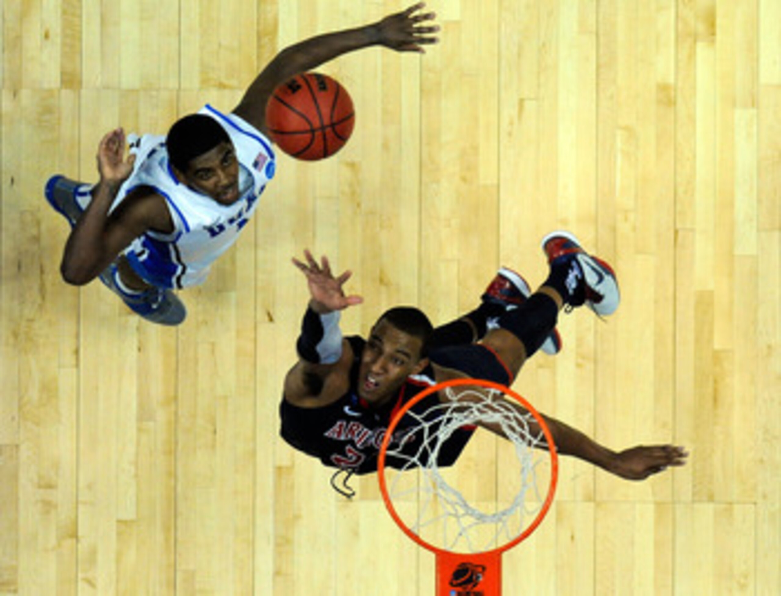 ANAHEIM, CA - MARCH 24:  Derrick Williams #23 of the Arizona Wildcats goes up for the ball against Kyrie Irving #1 of the Duke Blue Devils during the west regional semifinal of the 2011 NCAA men's basketball tournament at the Honda Center on March 24, 201
