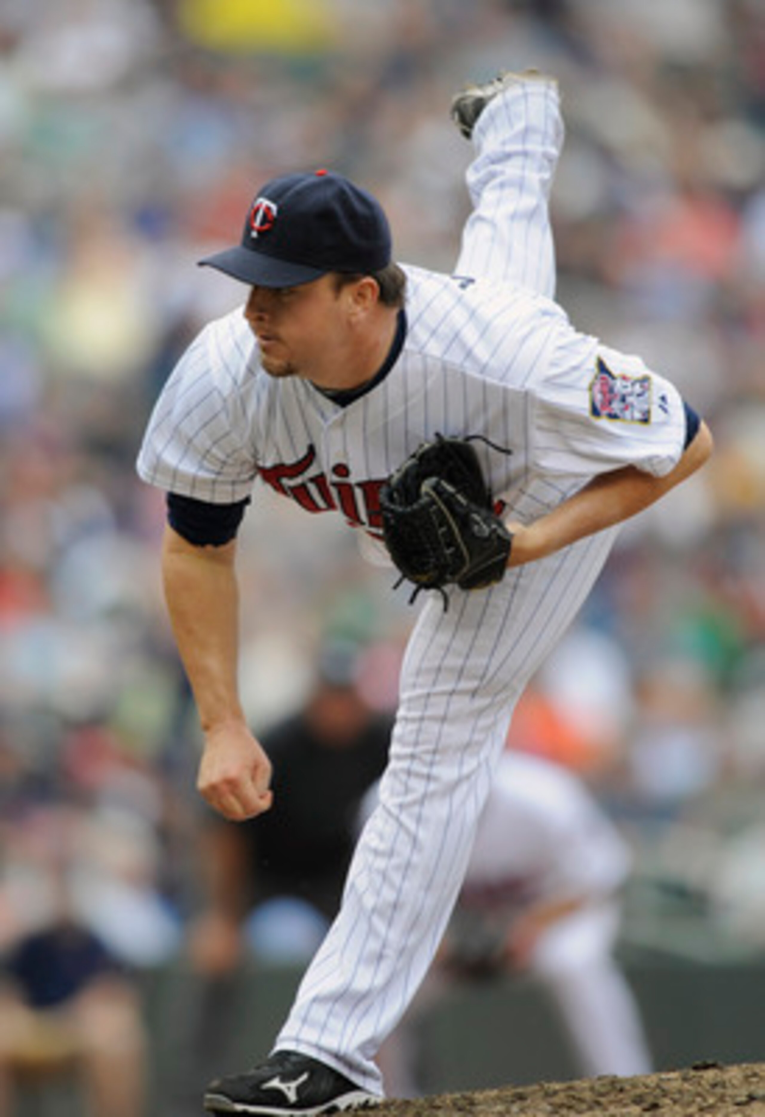 MINNEAPOLIS, MN - MAY 11: Matt Capps #55 of the Minnesota Twins pitches against the Detroit Tigers during in the eighth inning of their game on May 11, 2011 at Target Field in Minneapolis, Minnesota. Tigers defeated the Twins 9-7. (Photo by Hannah Foslien
