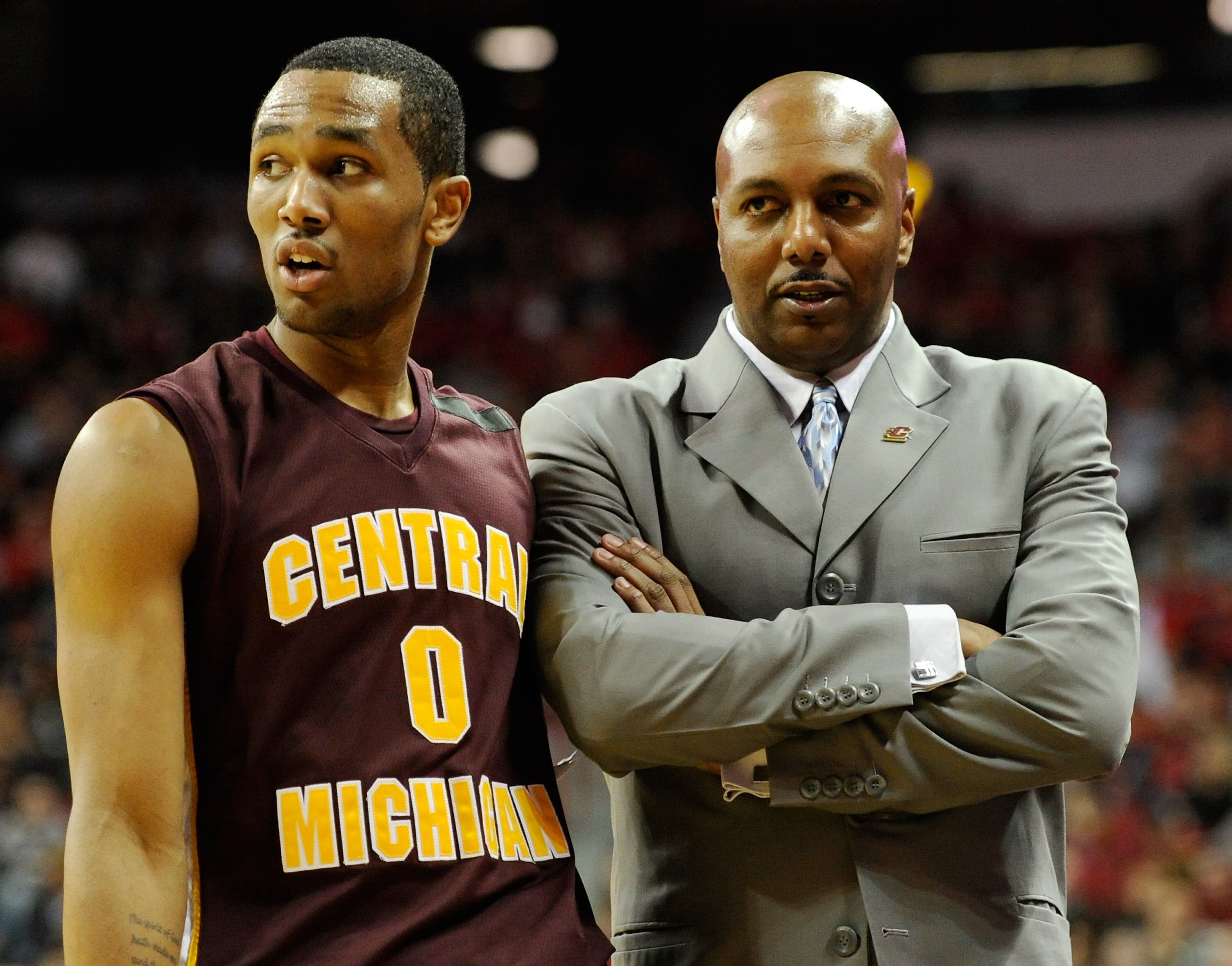 LAS VEGAS, NV - DECEMBER 30:  Trey Zeigler #0 of the Central Michigan Chippewas talks to his father, head coach Ernie Zeigler, during their game against the UNLV Rebels at the Thomas & Mack Center December 30, 2010 in Las Vegas, Nevada. UNLV won 73-47.  (