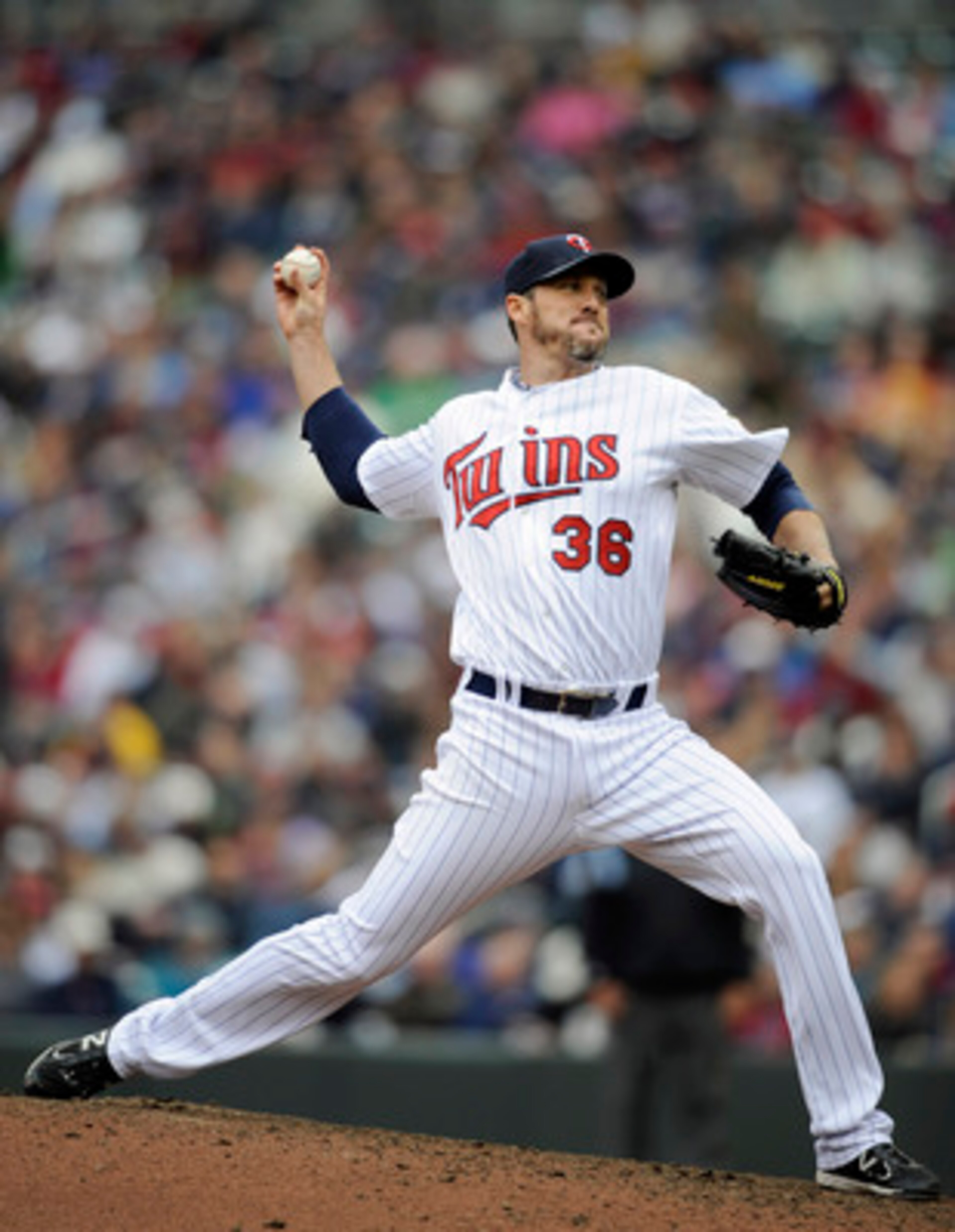 MINNEAPOLIS, MN - APRIL 23: Joe Nathan #36 of the Minnesota Twins pitches against the Cleveland Indians during the ninth inning of their game on April 23, 2011 at Target Field in Minneapolis, Minnesota. (Photo by Hannah Foslien/Getty Images)